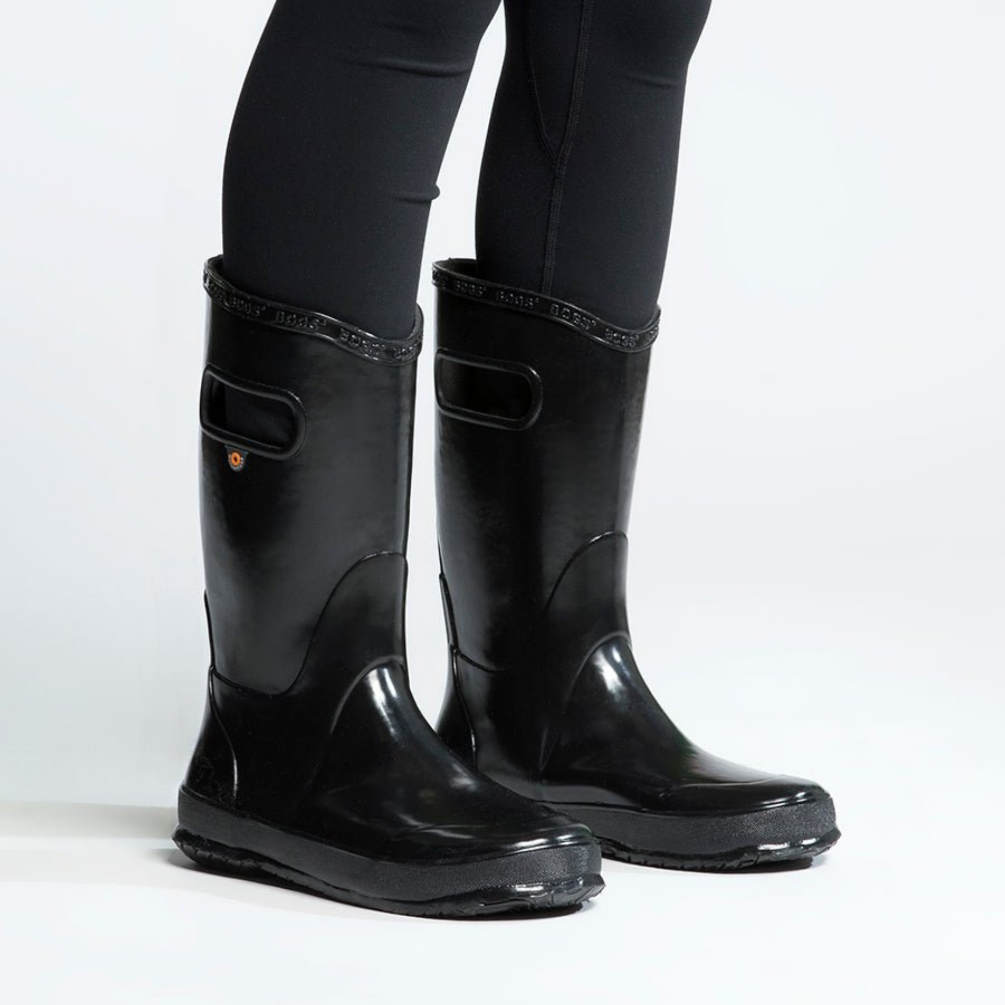 A person wearing BOGS waterproof rain boots in Whistler