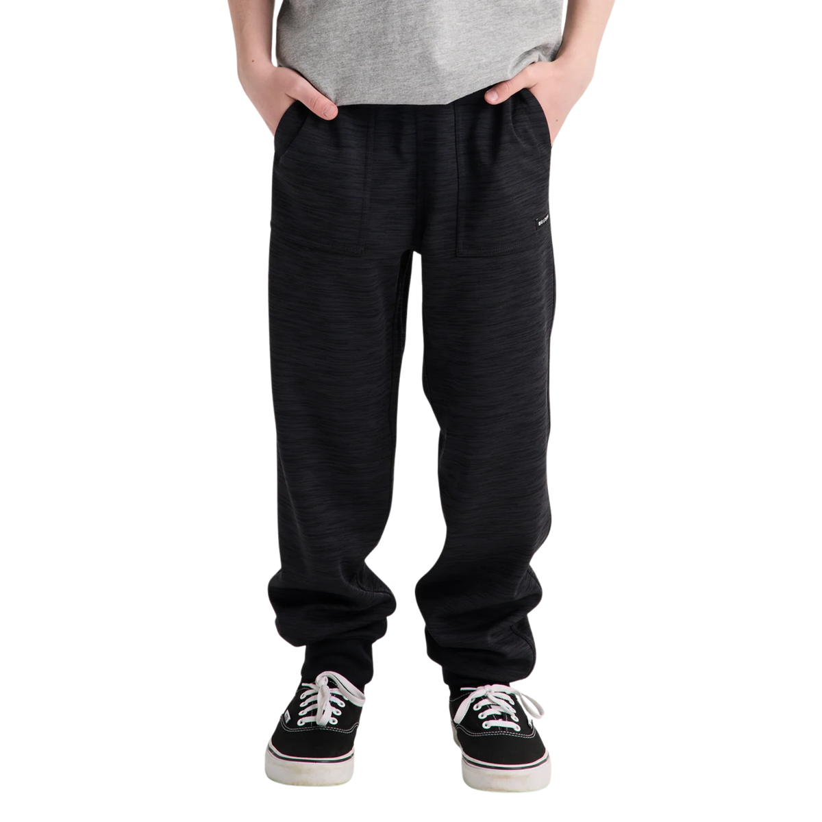 Front view of Burton Kids Oak Fleece Pants in True Black Heather with recycled brushback fleece, drawcord waistband and patch-on handwarmer pockets