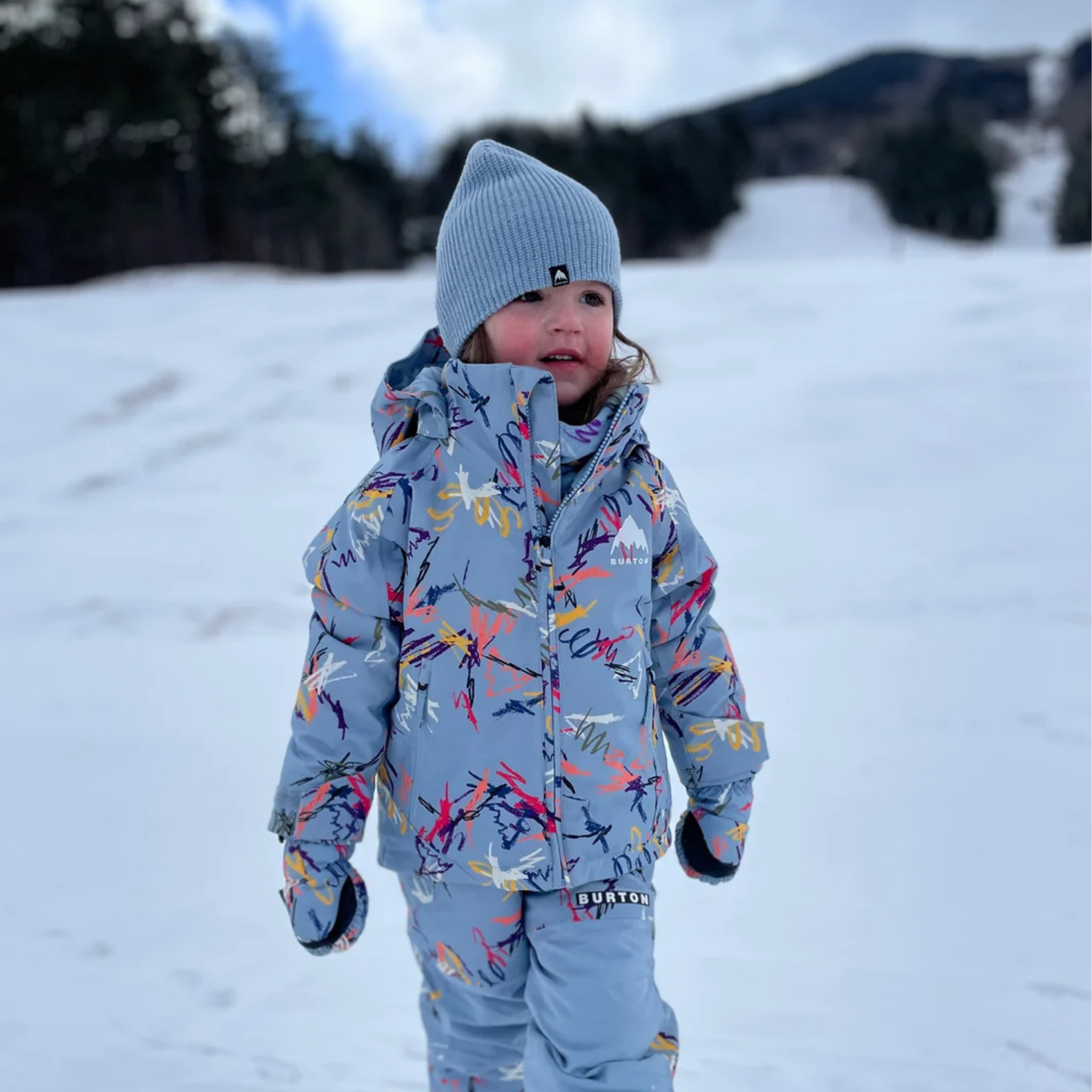 Toddler wearing Burton Hillslope 2L Jacket with 180g insulation and 10K waterproofing on a snowy day in Whistler