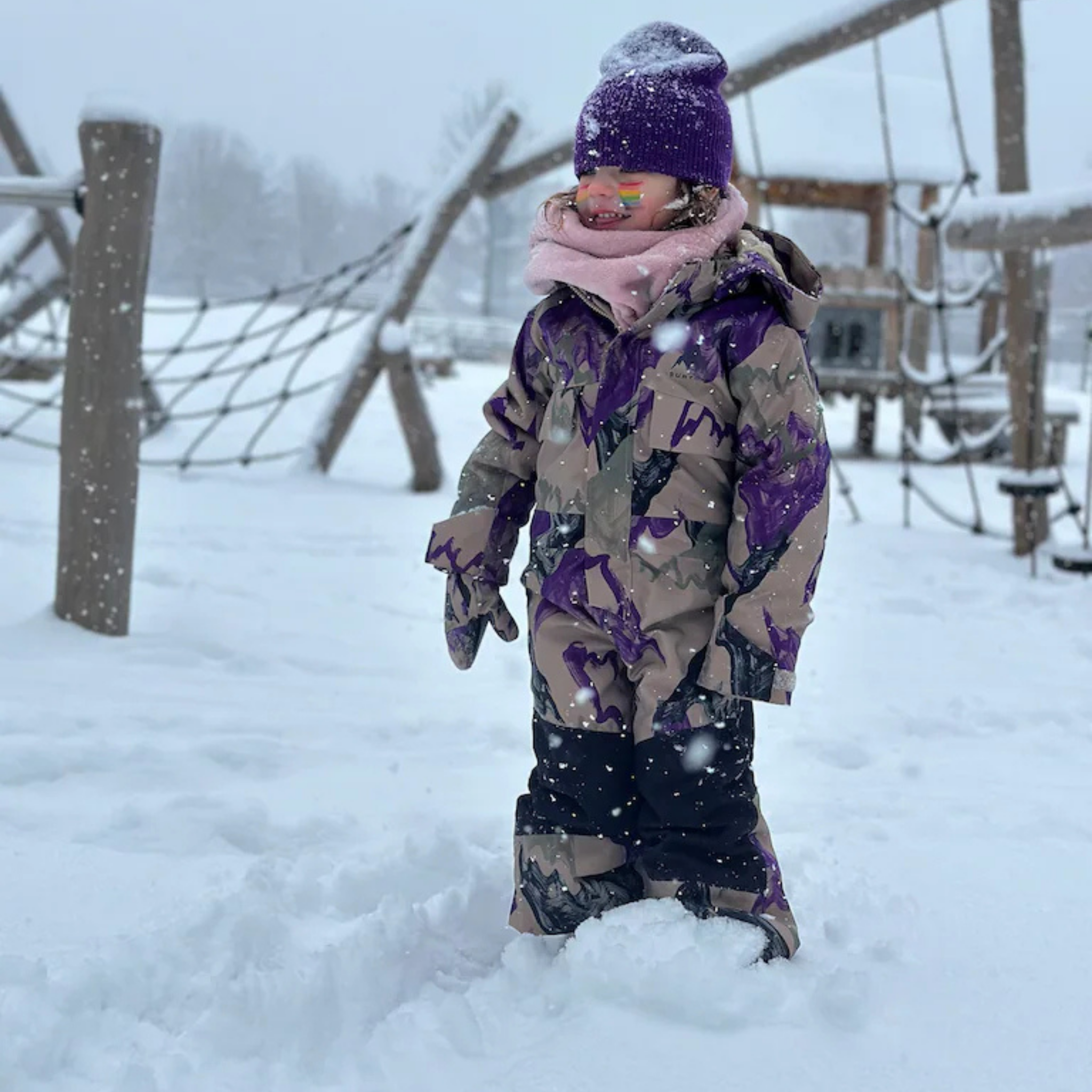 Toddler wearing Burton One-Piece Snowsuit with 100g insulation and 15K waterproofing in Whistler snow