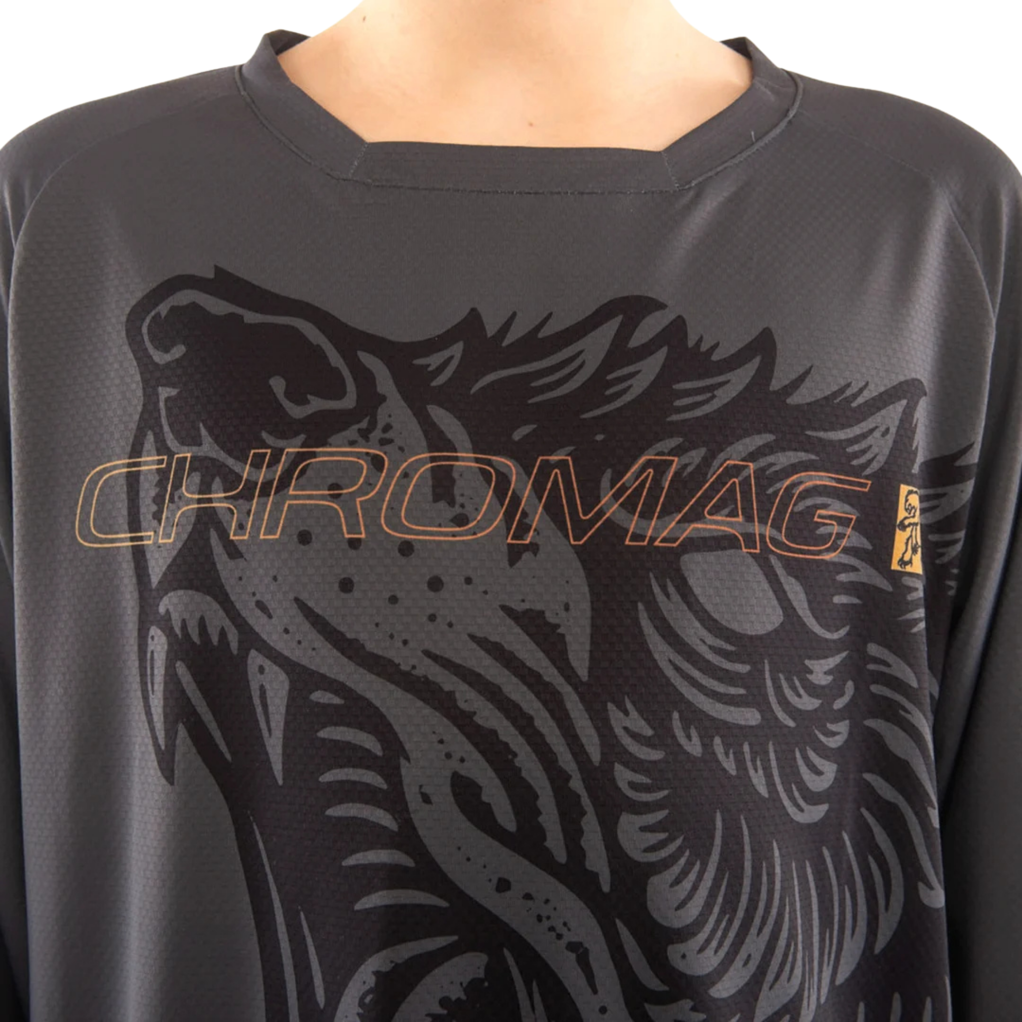 Close-up of the lightweight stretch performance fabric on the Chromag Dominion jersey in Creature Grey design
