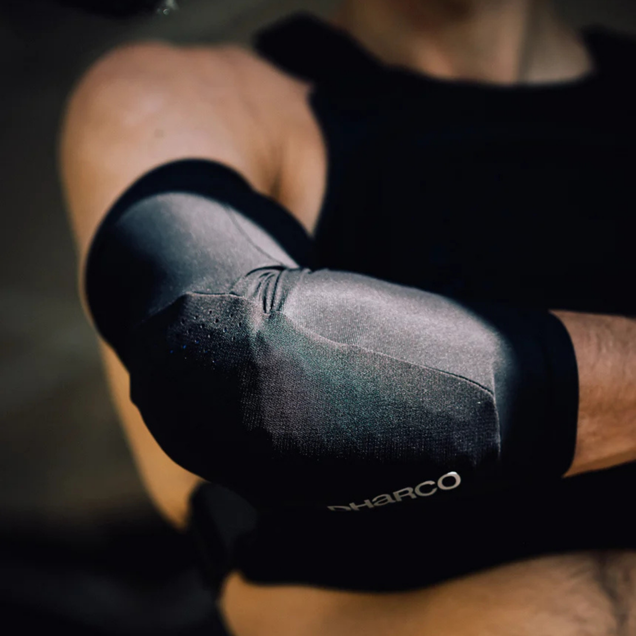 Young mountain biker wearing DHaRCO Youth Gravity Elbow Pads with CE Level 1 RHEON protection while riding in Whistler