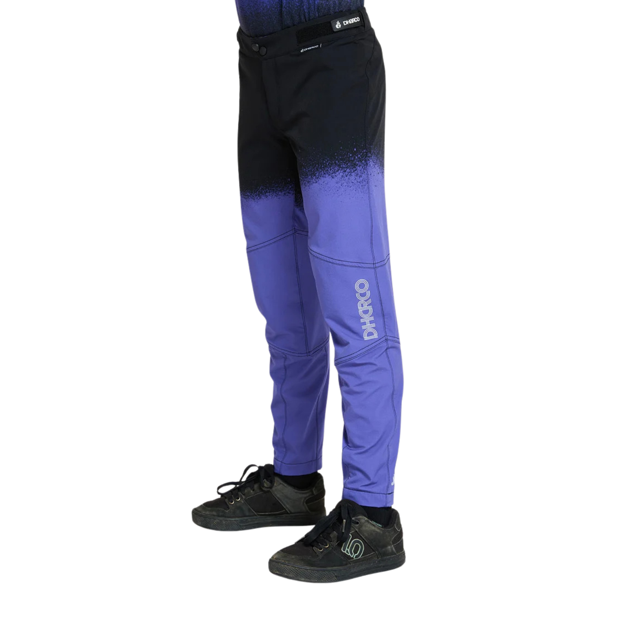 Side view of DHaRCO Youth Gravity Pants in Ultra Violet with articulated cut, knee pad room and breathable 4-way stretch fabric