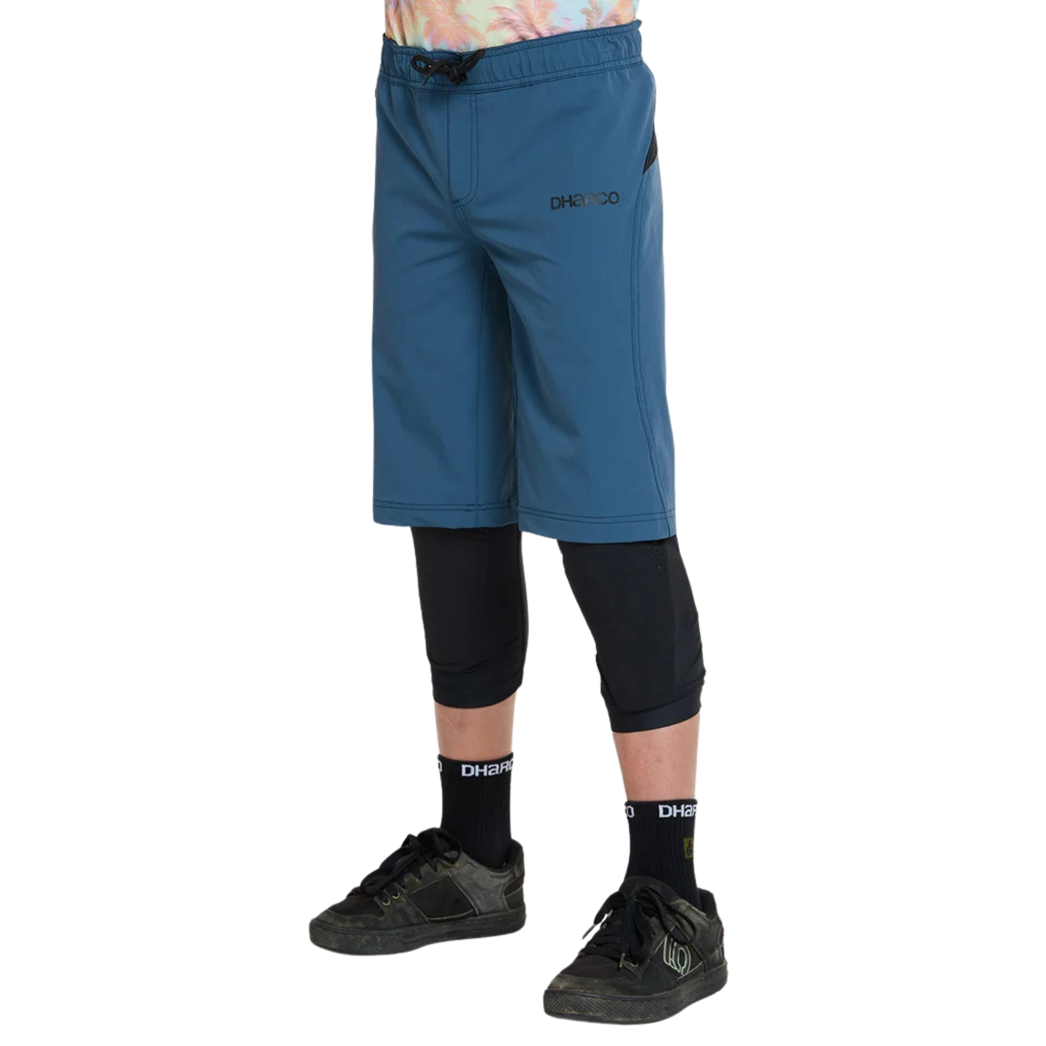 Side view of DHaRCO Youth Gravity Shorts in Maverick with longer MTB fit, 4-way stretch fabric and zippered pocket