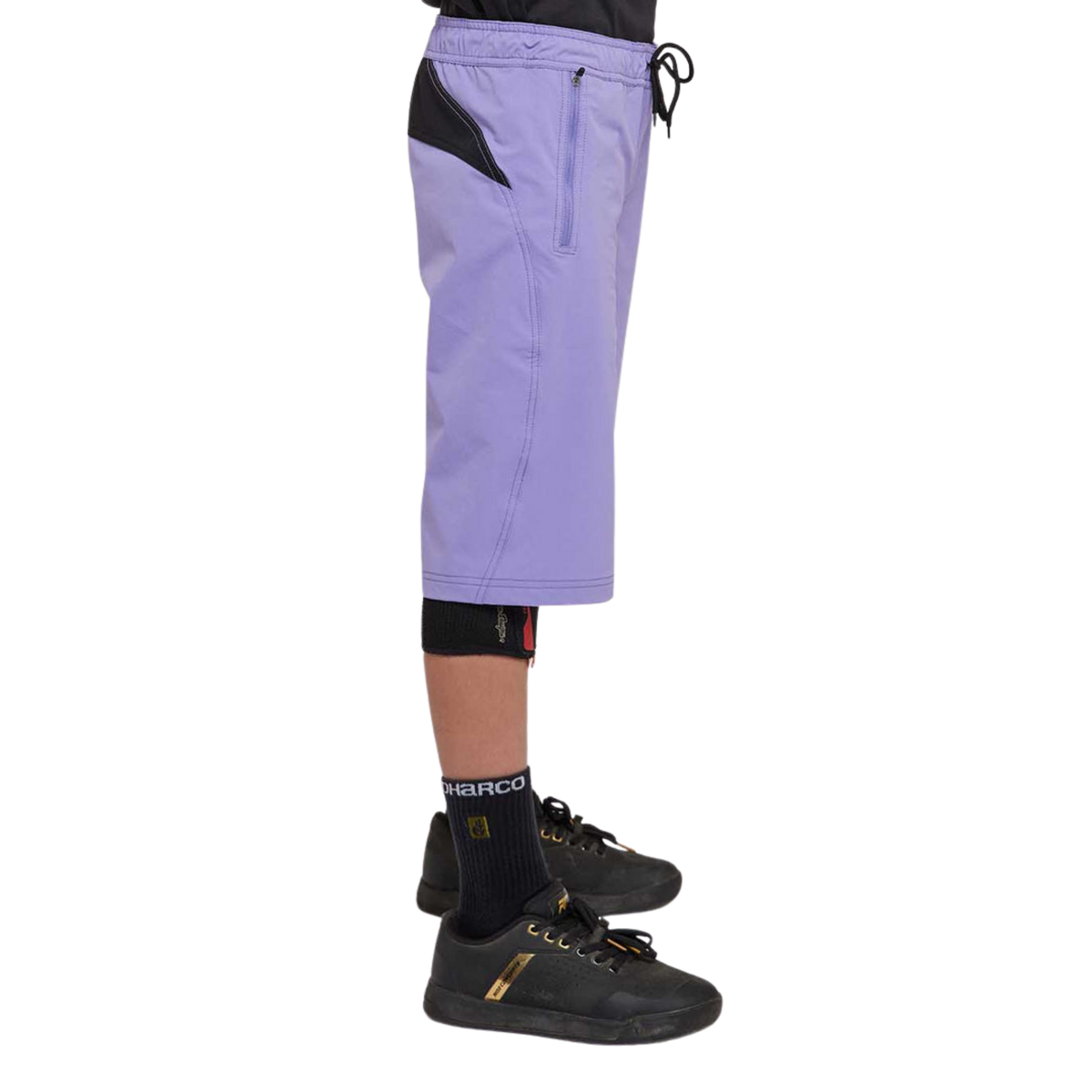 Side view of DHaRCO Youth Gravity Shorts in Purple Haze with longer MTB fit, 4-way stretch fabric and zippered pocket