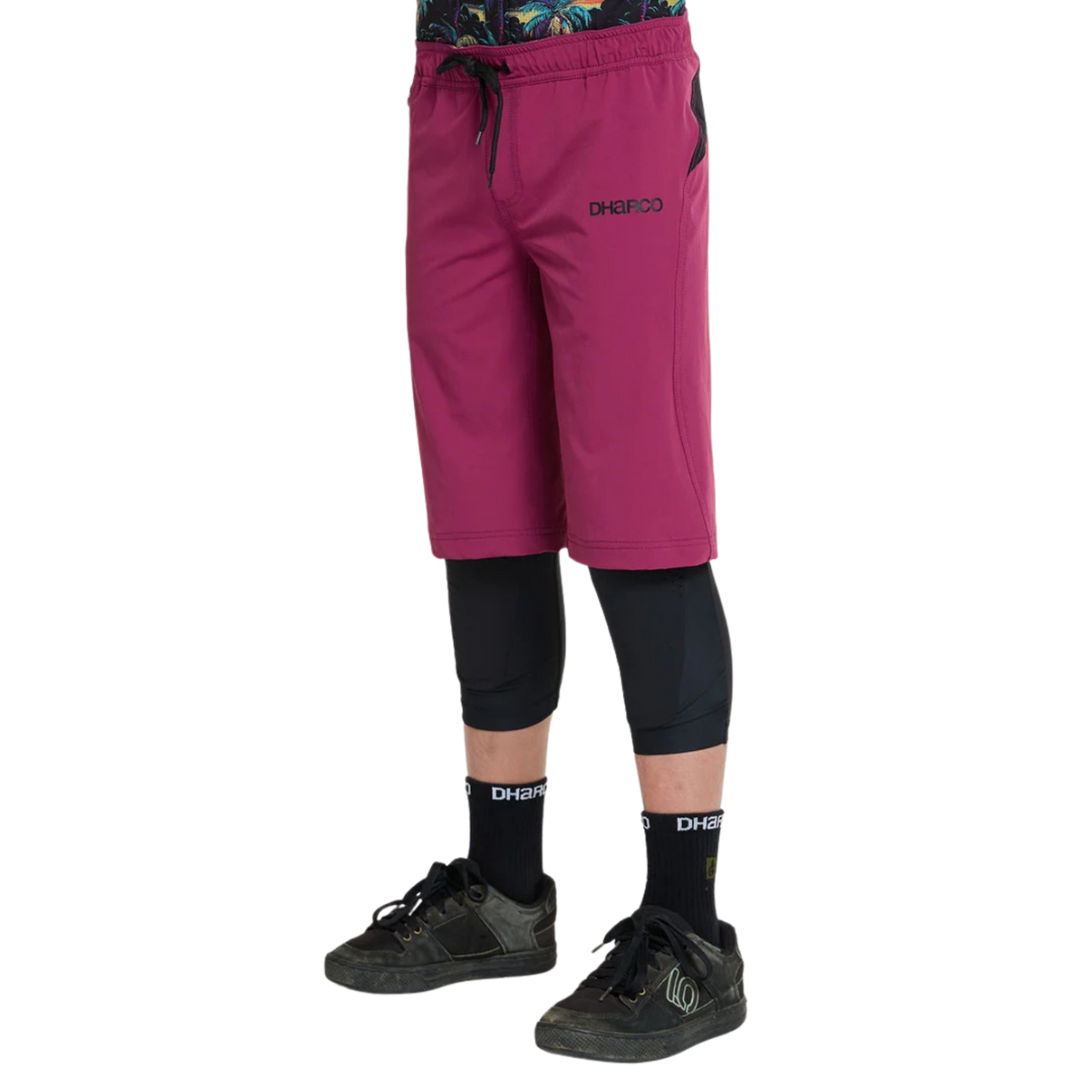 Side view of DHaRCO Youth Gravity Shorts in Sangria with longer MTB fit, 4-way stretch fabric and zippered pocket