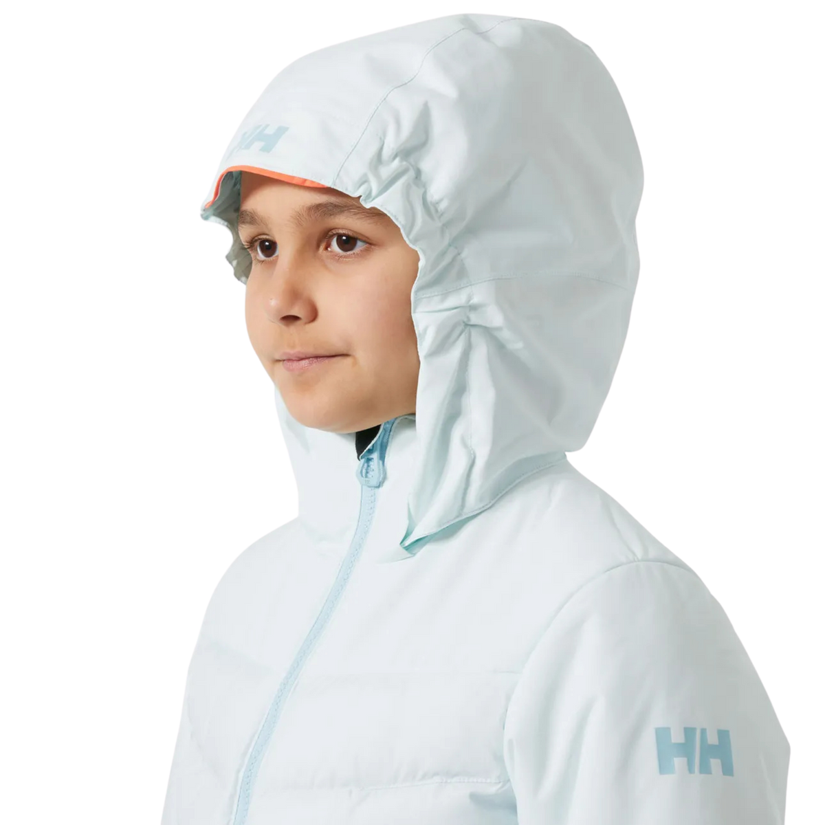 Helly Hansen Jr Girl Astra Jacket in Icicle color with detachable hood detail for versatile weather protection on the mountain