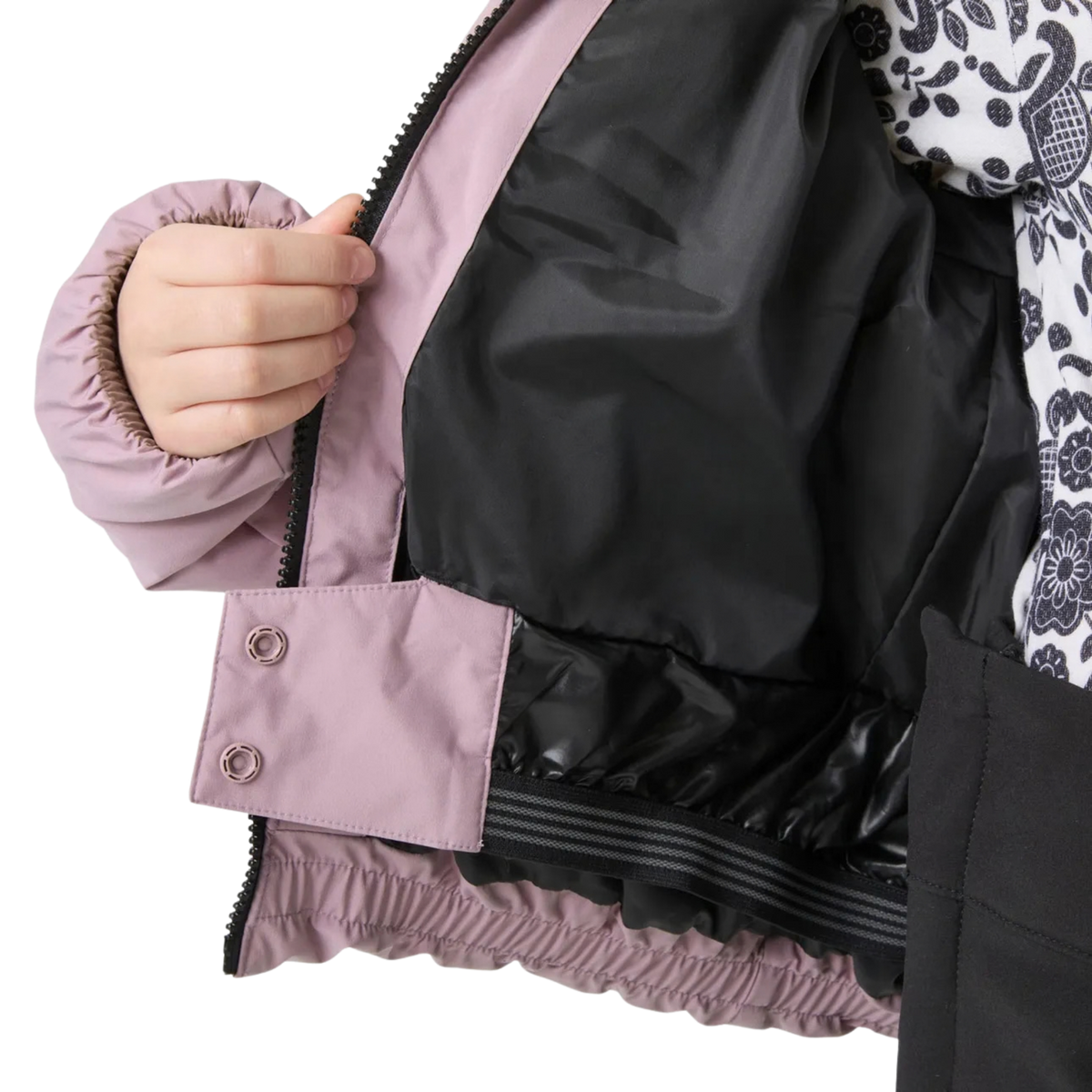 Helly Hansen Jr Girl Nora Puffy Ski Jacket in Purple Clay with adjustable internal powder skirt designed to help prevent snow from entering at the waist
