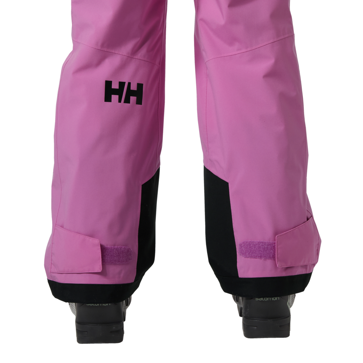 Helly Hansen Jr Stellar Bib Pants in Meta Pink with internal boot gaiter and gripper elastic designed to help keep snow out of ski boots