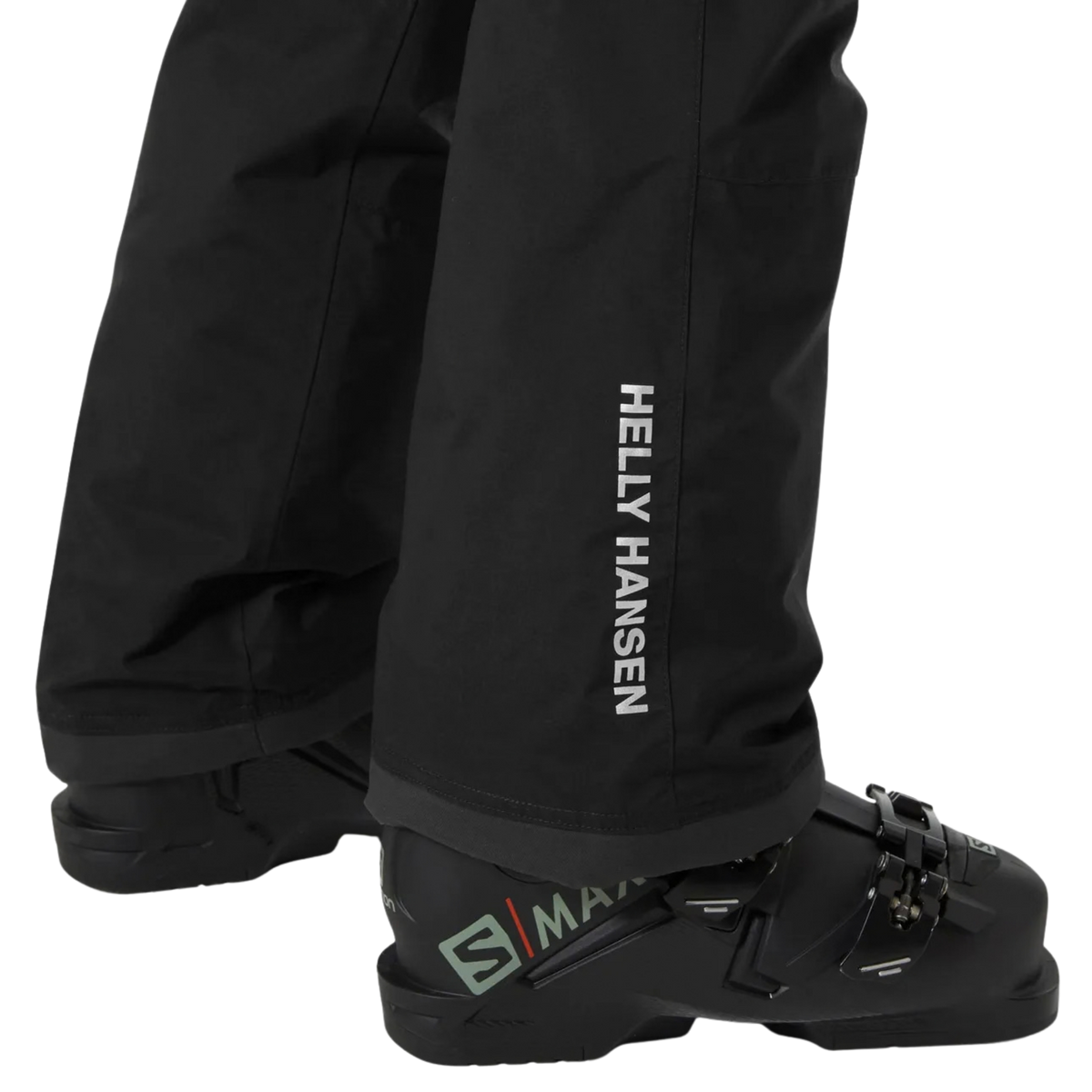 Helly Hansen Junior Legendary Pants in Black with internal boot gaiter and gripper elastic designed to help keep snow out of ski boots