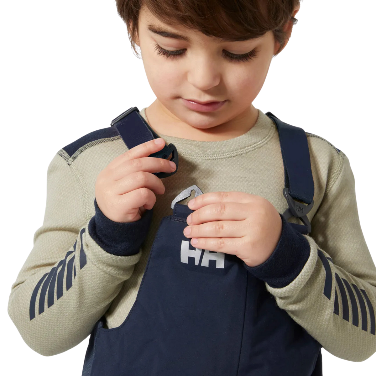 Helly Hansen Kids Rider 2.0 Insulated Bib Pants in Navy with adjustable elastic suspenders for a secure customizable fit