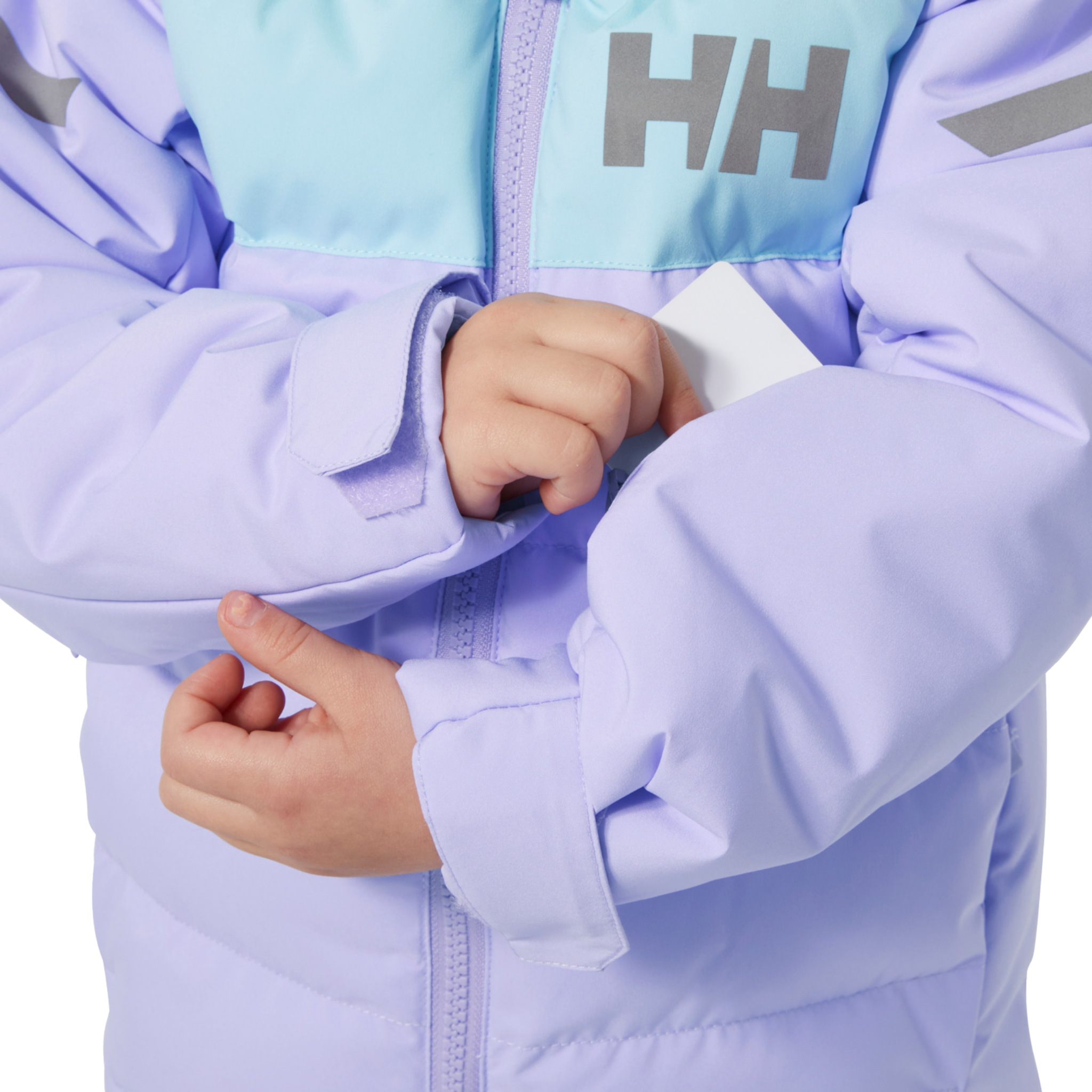 Helly Hansen Kids Vertical Insulated Jacket in Bright Lavender with ski-pass pocket detail for convenient lift access during ski and snowboard days