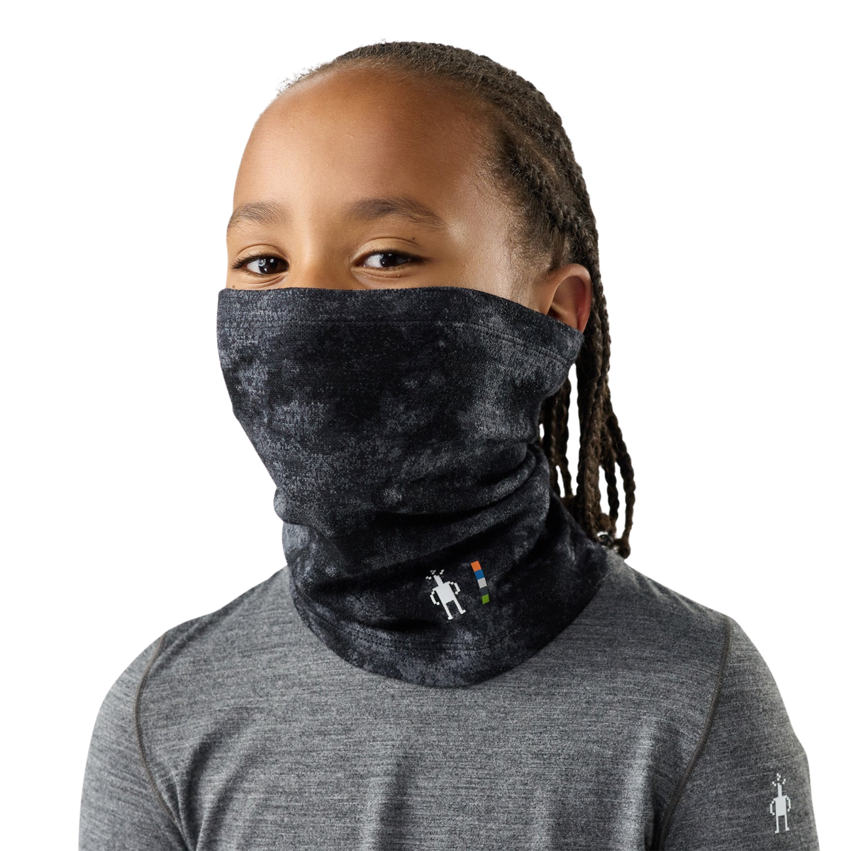 Smartwool Thermal Merino Neck Gaiter in Black Tie Dye design sized specifically for smaller kids’ heads and necks with extended winter coverage