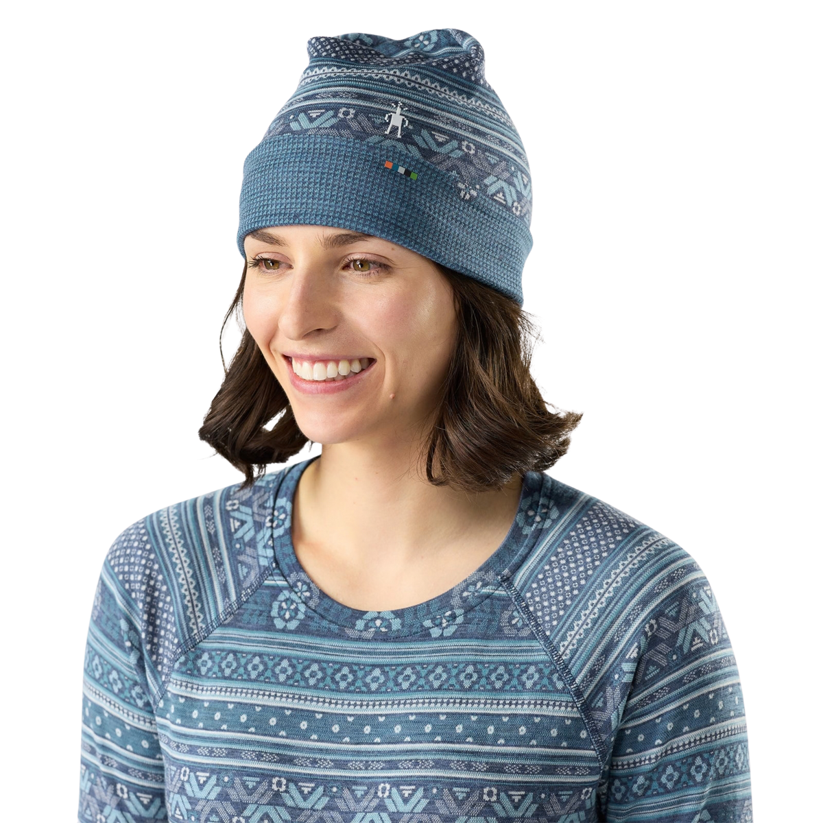 Front view of Smartwool Thermal Merino Reversible Cuffed Beanie in Nightfall Fair Isle Fun design with midweight Merino wool and folded ear-warming cuff