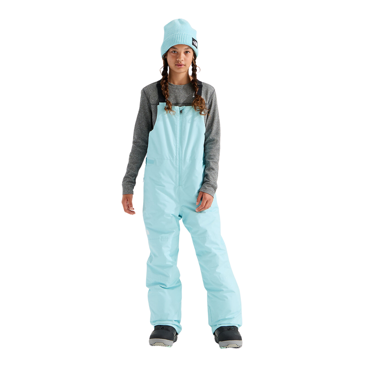 Front view of The North Face Teen Freedom Insulated Bib Pant in Glacier color showing adjustable suspenders, bib construction and reverse-coil centre-front zipper