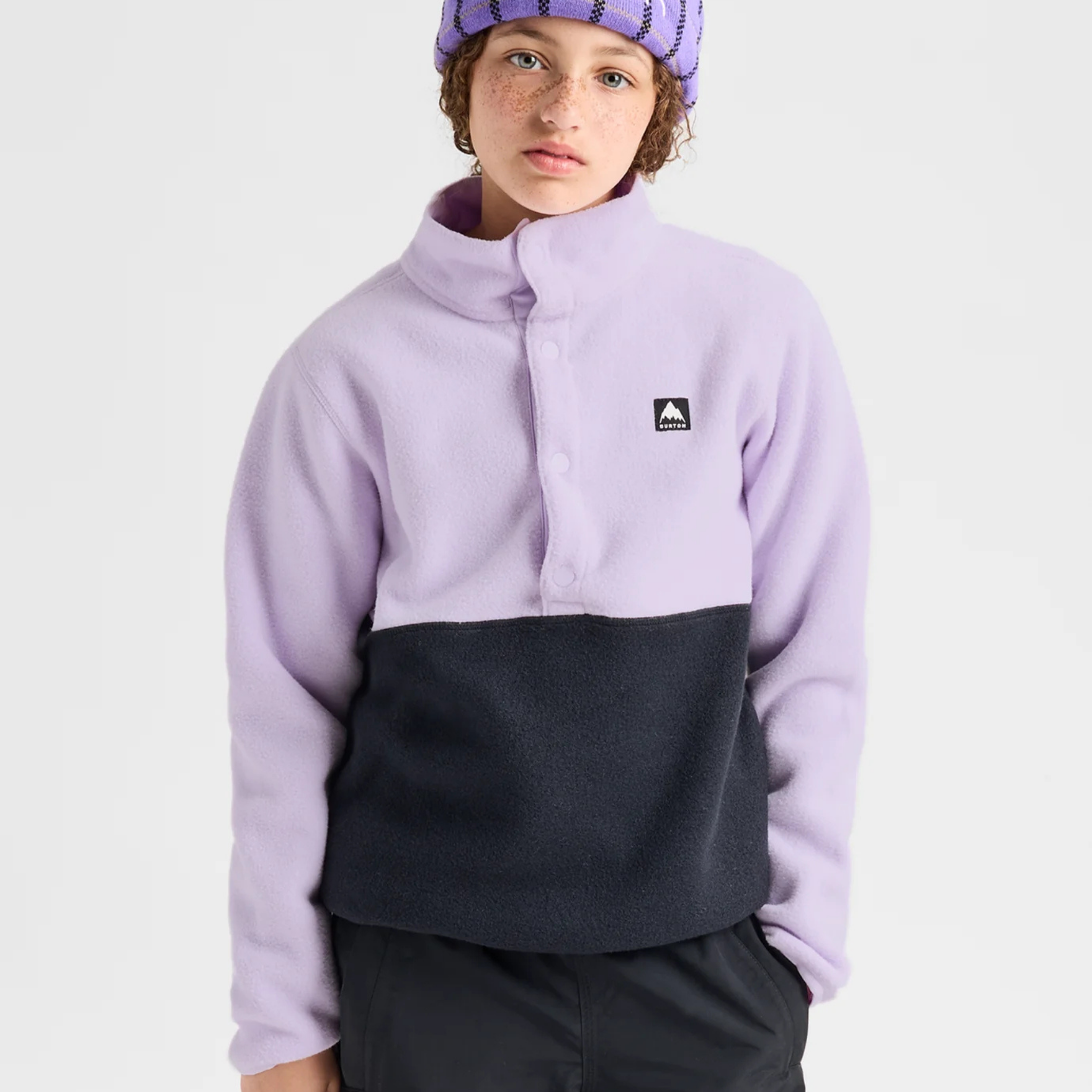 Front view of Burton Kids' Cinder Fleece Anorak in Moondust Purple and True Black with reinforced snap front placket