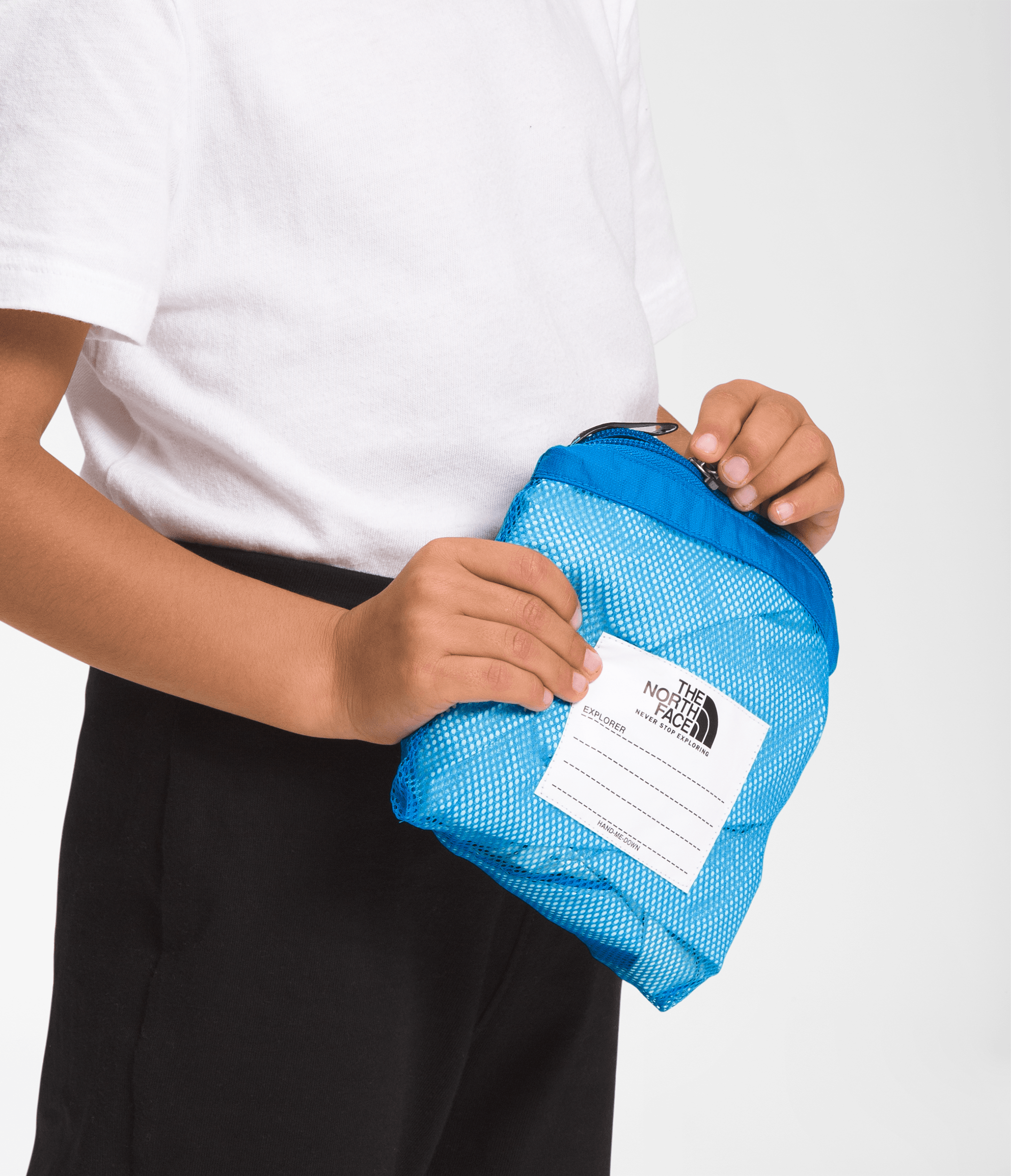 Pouch detail on The North Face Kids Antora Rain Pants in Sonic Blue.