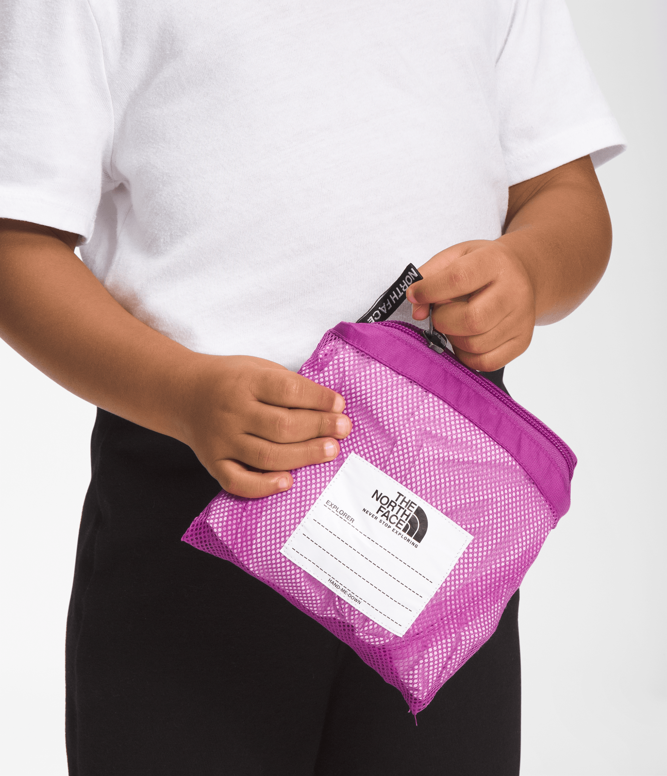 Pouch detail on The North Face Kids Antora Rain Pants in Purple Cactus Flower.