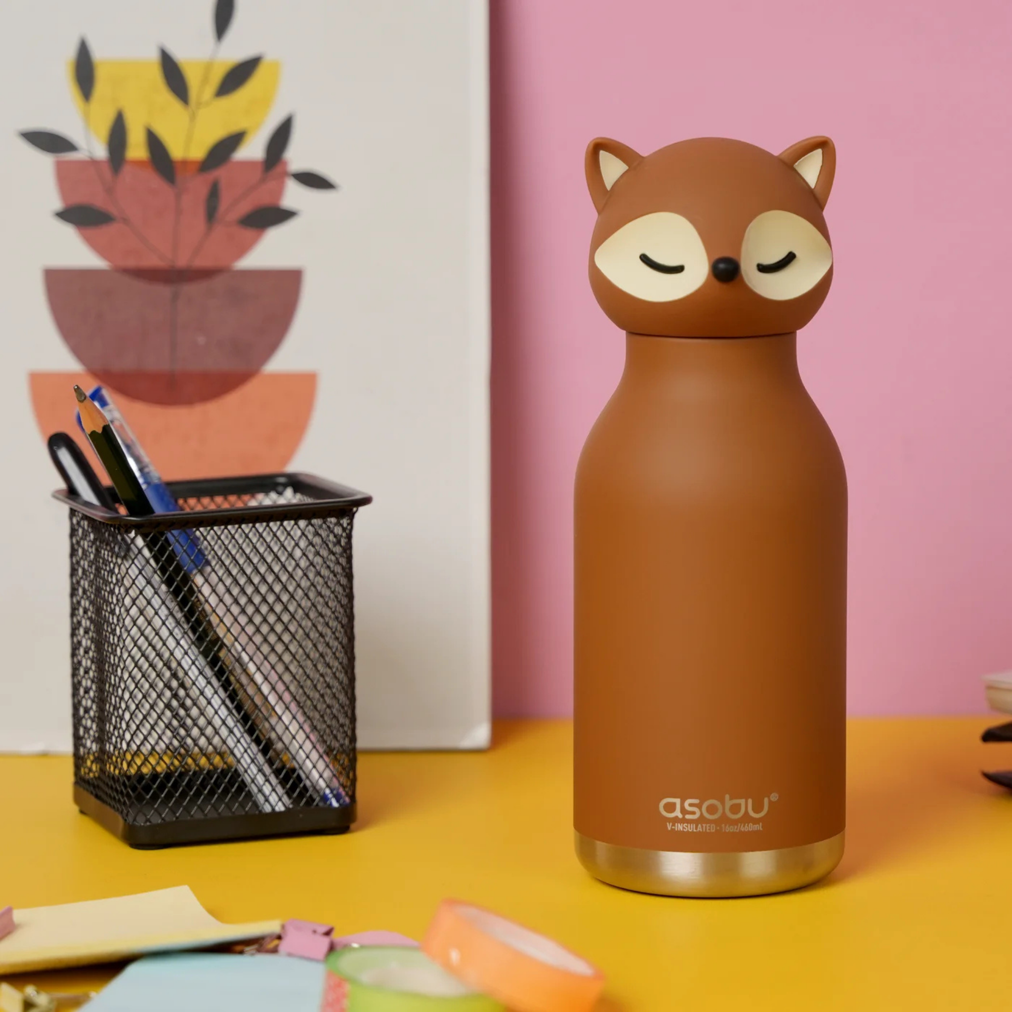 Child carrying Asobu Animal Bestie Bottle in Fox design with removable silicone character head during an everyday adventure in Whistler
