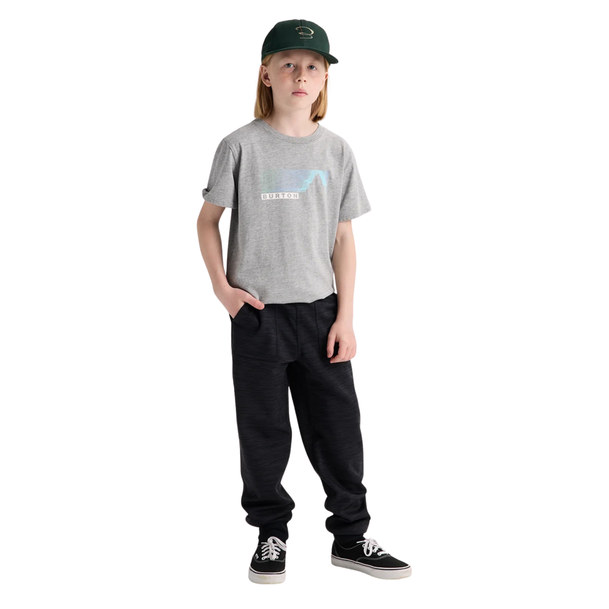 Child wearing Burton Kids Oak Fleece Pants in True Black Heather with recycled brushback fleece during a cool-weather day in Whistler