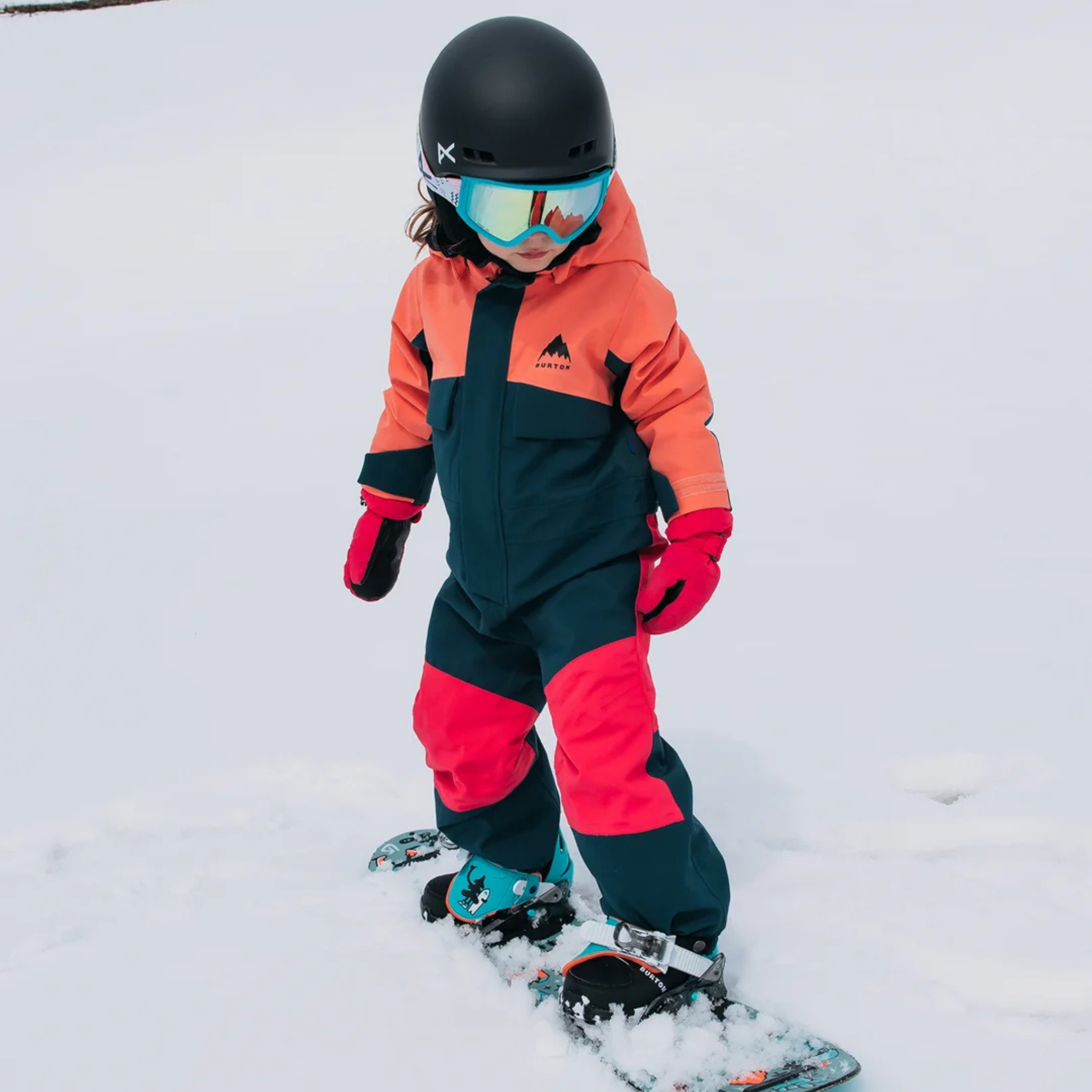 Young rider wearing Burton One-Piece Snowsuit in Peach Echo / Deep Emerald design with 15K waterproofing and 100g insulation in Whistler
