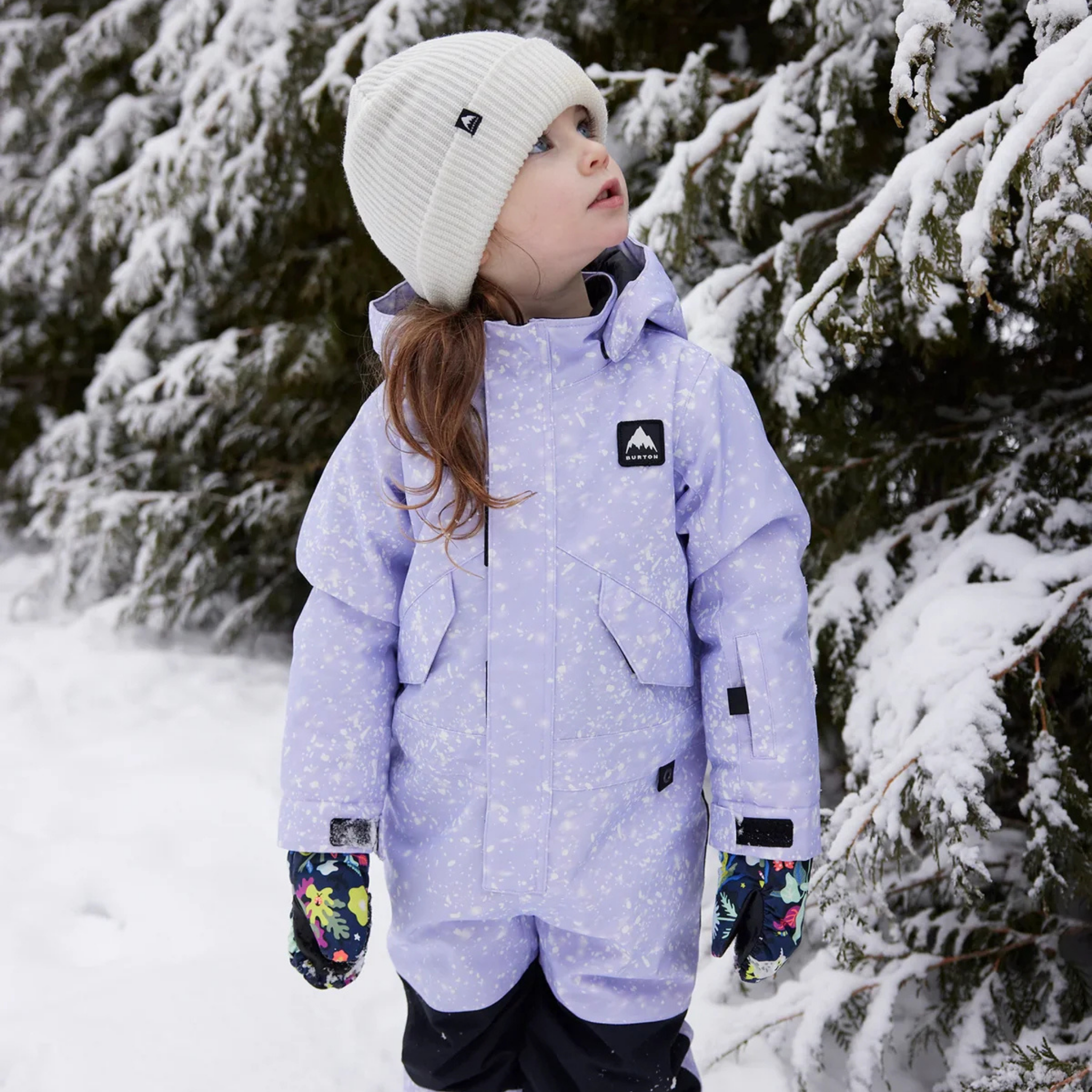 Toddler wearing Burton One-Piece Snowsuit with 100g insulation and 15K waterproofing in Whistler snow