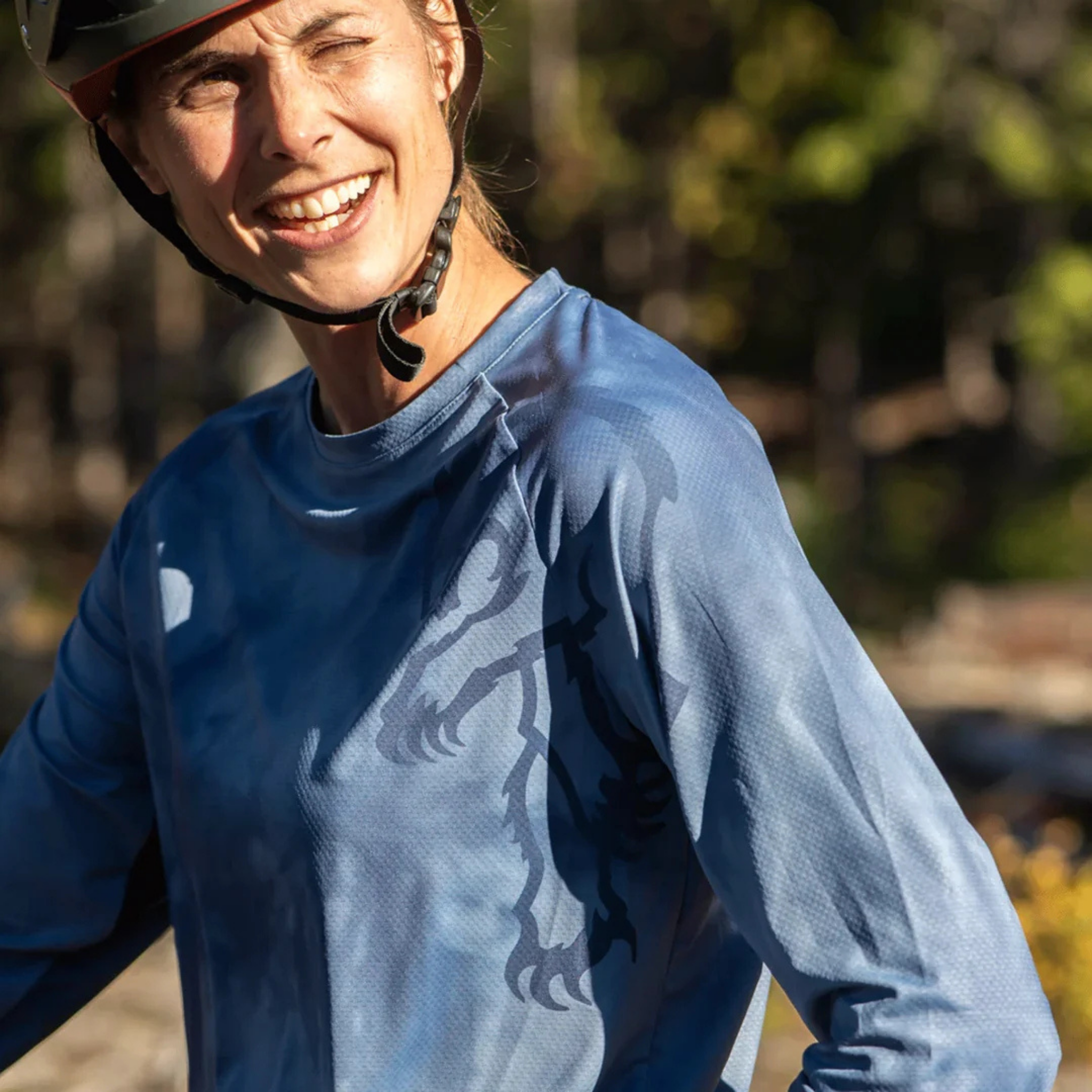 Mountain biker wearing Chromag Dominion long sleeve jersey riding trails in Whistler