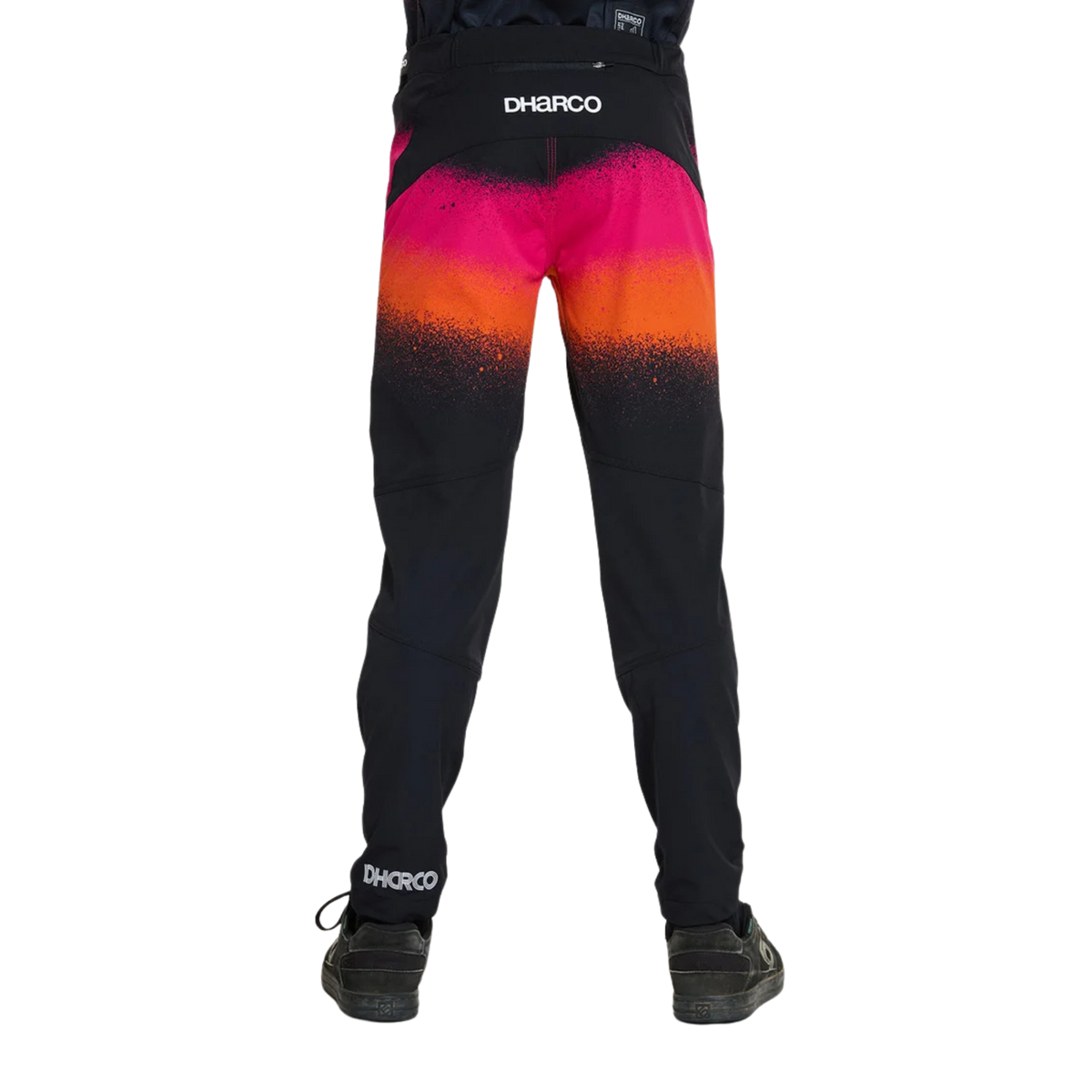 Rear view of DHaRCO Youth Gravity Pants in Black Snake design with water-resistant 95% nylon 5% spandex construction and articulated fit
