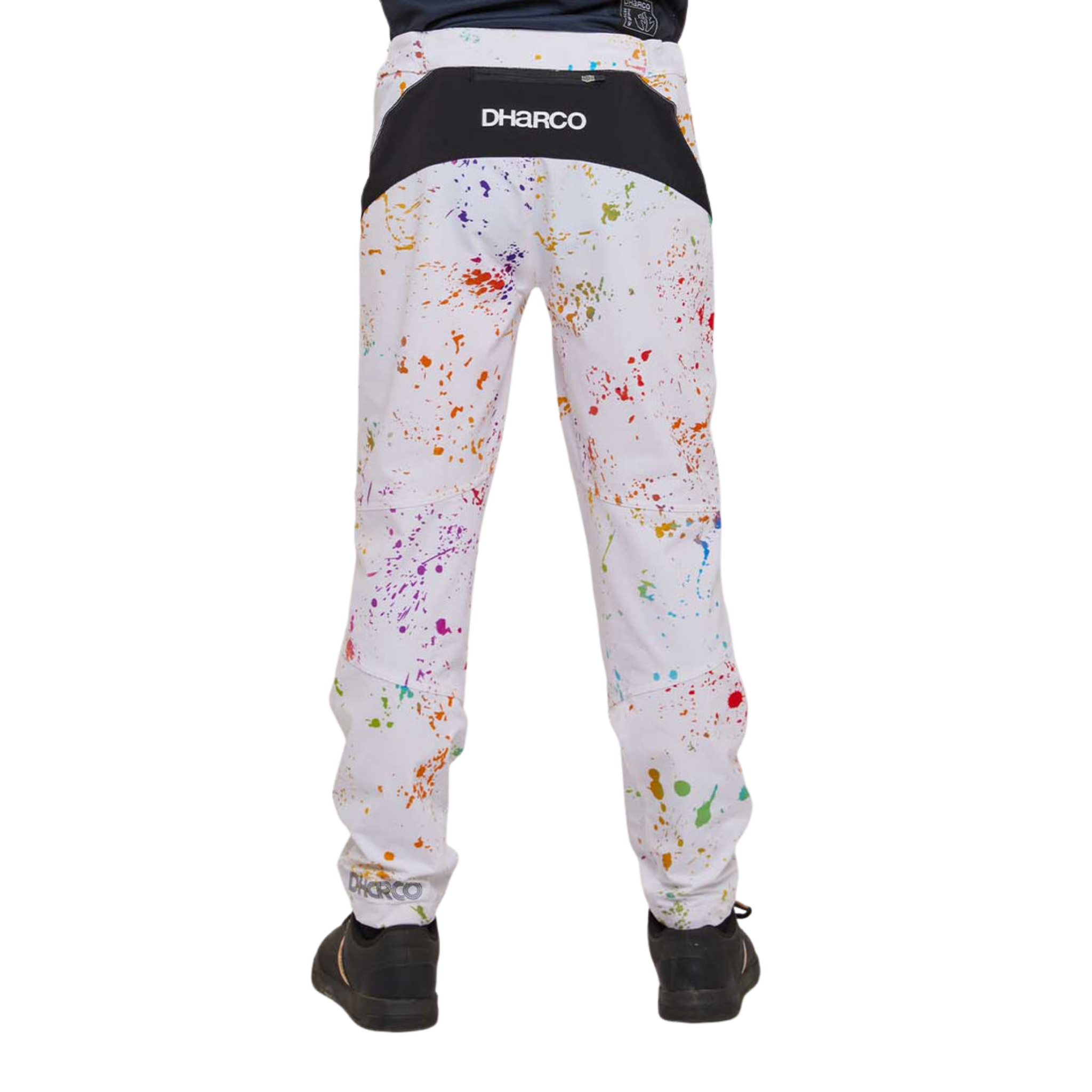 Rear view of DHaRCO Youth Gravity Pants in Paint Splat design with water-resistant 95% nylon 5% spandex construction and articulated fit