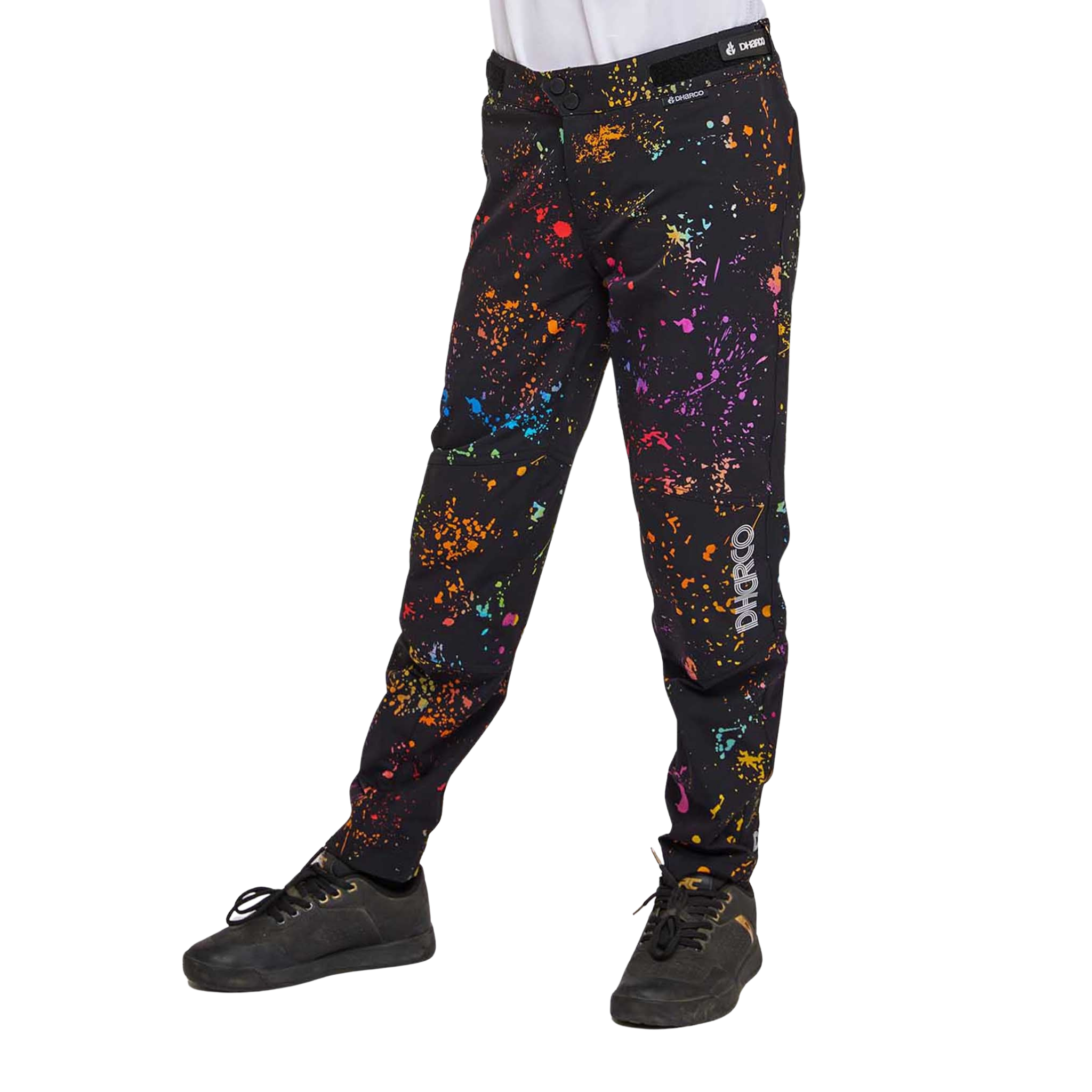 Side view of DHaRCO Youth Gravity Pants in Supernova design with articulated cut, knee pad room and breathable 4-way stretch fabric