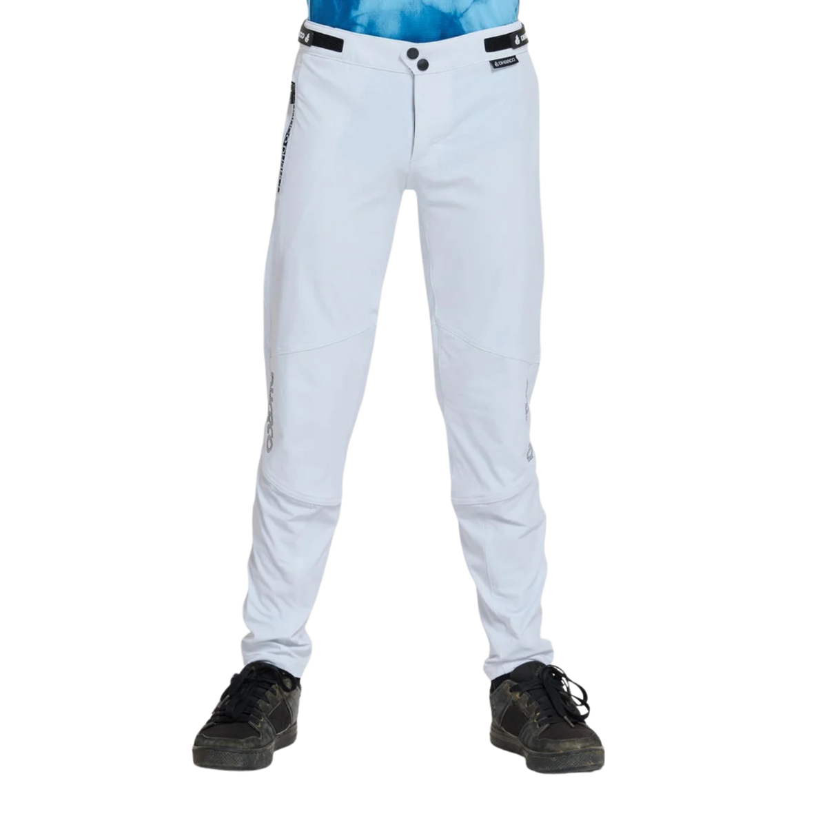DHaRCO Youth Gravity Pants in White with 95% nylon 5% spandex, water-resistant 4-way stretch fabric and knee pad-compatible fit
