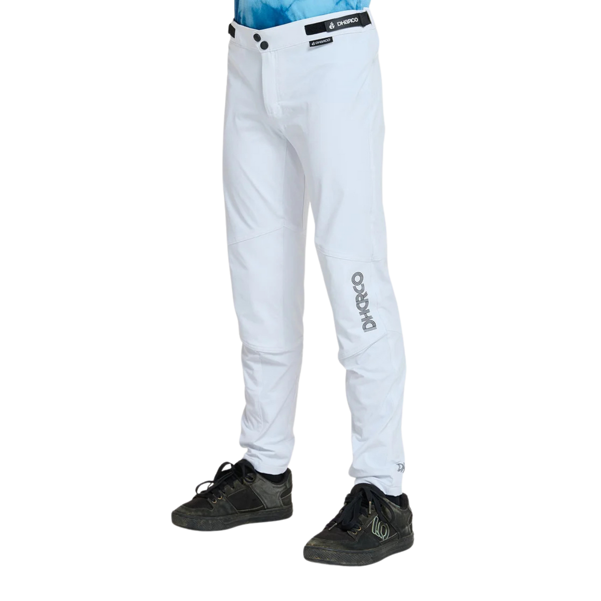 Side view of DHaRCO Youth Gravity Pants in White with articulated cut, knee pad room and breathable 4-way stretch fabric
