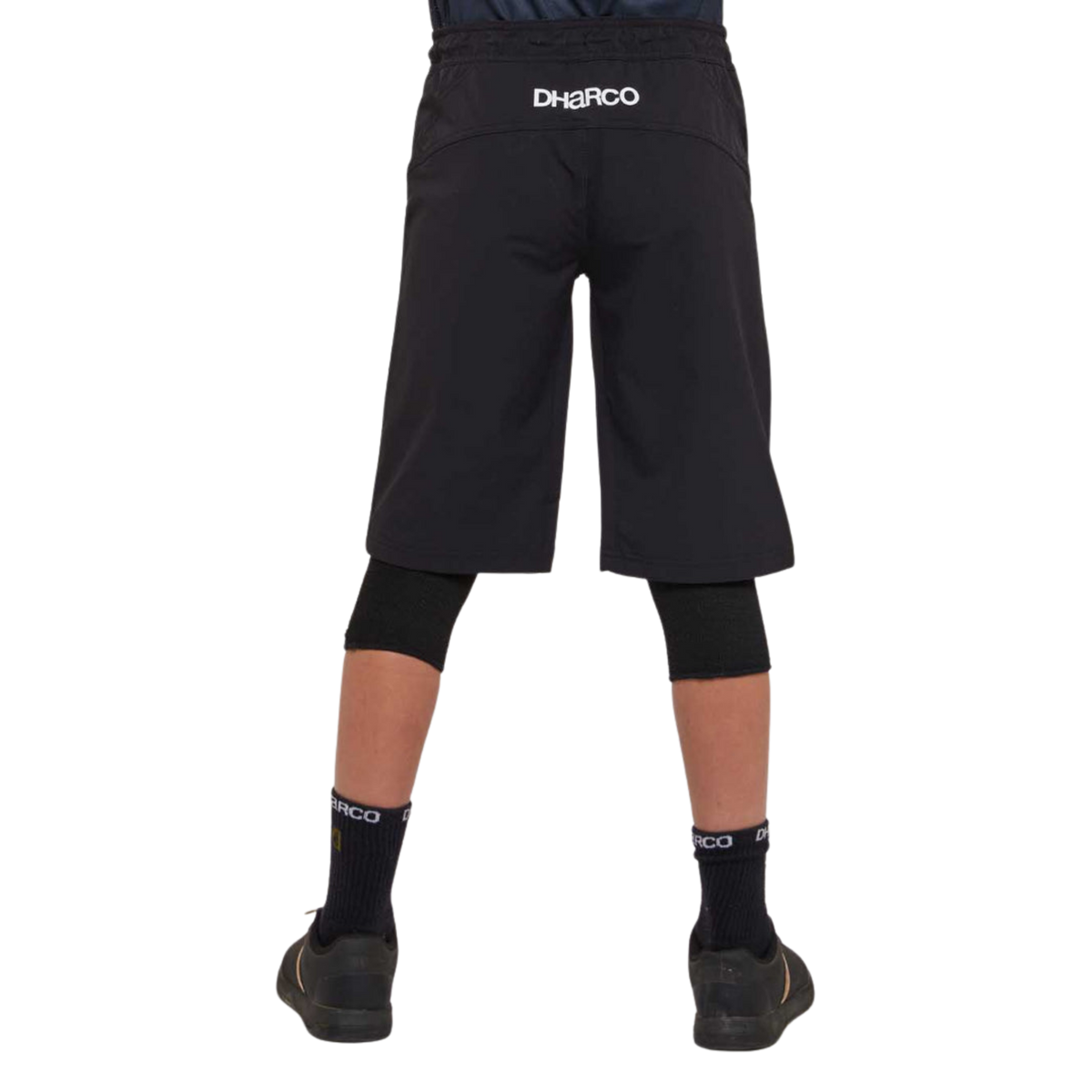 Rear view of DHaRCO Youth Gravity Shorts in Black with durable water-resistant fabric and longer knee pad-compatible fit