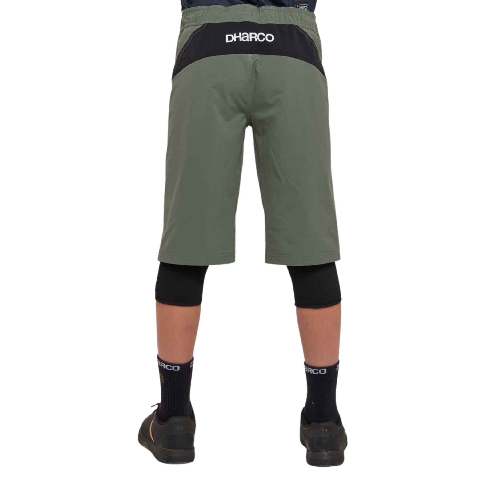Rear view of DHaRCO Youth Gravity Shorts in Gorilla Green with durable water-resistant fabric and longer knee pad-compatible fit