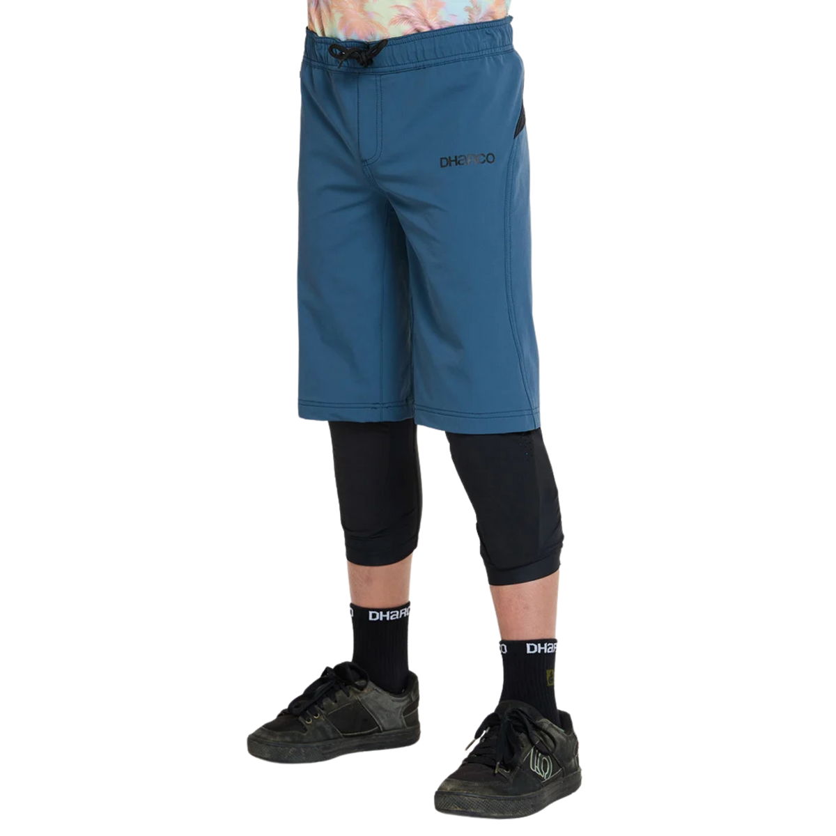 Side view of DHaRCO Youth Gravity Shorts in Maverick with longer MTB fit, 4-way stretch fabric and zippered pocket