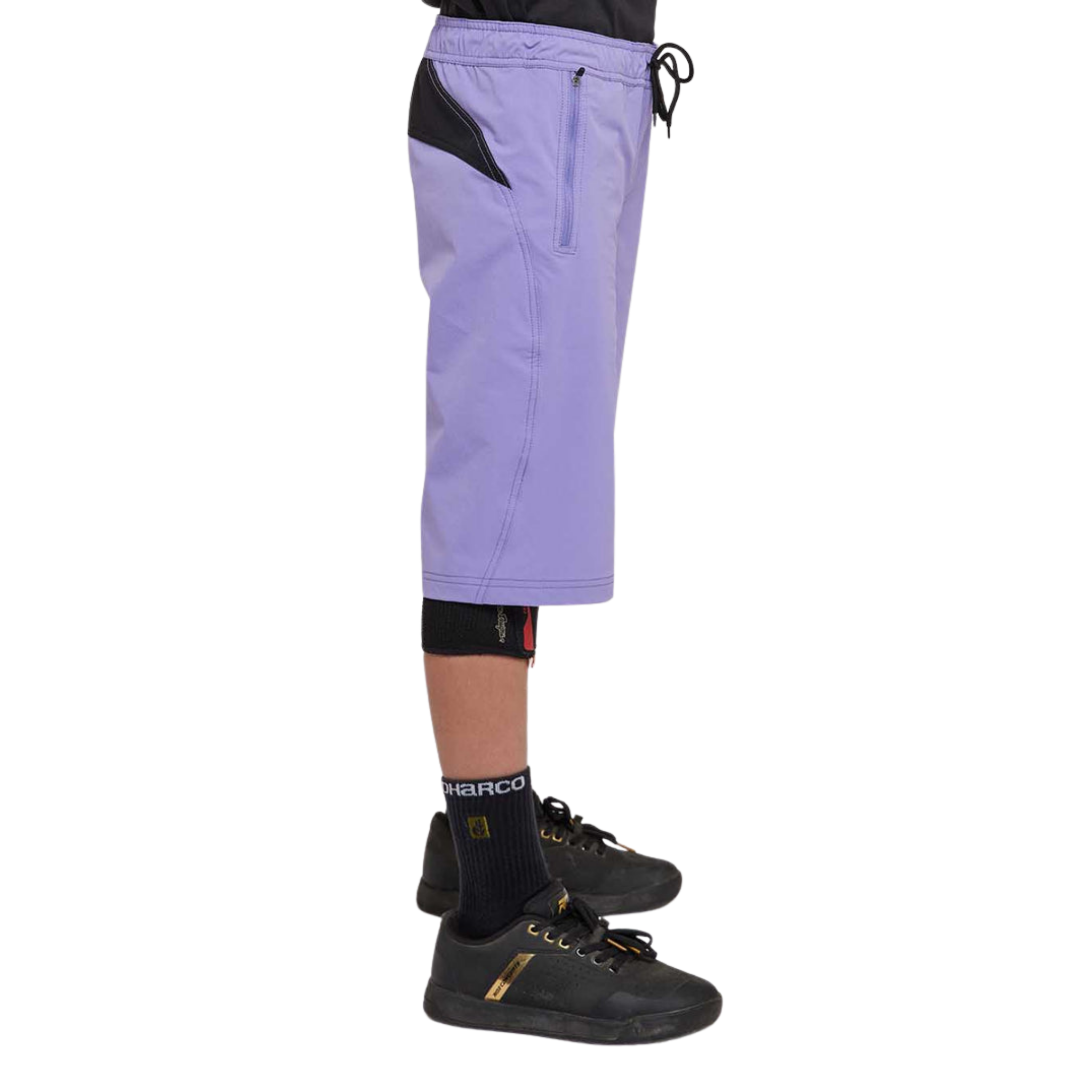 Side view of DHaRCO Youth Gravity Shorts in Purple Haze with longer MTB fit, 4-way stretch fabric and zippered pocket