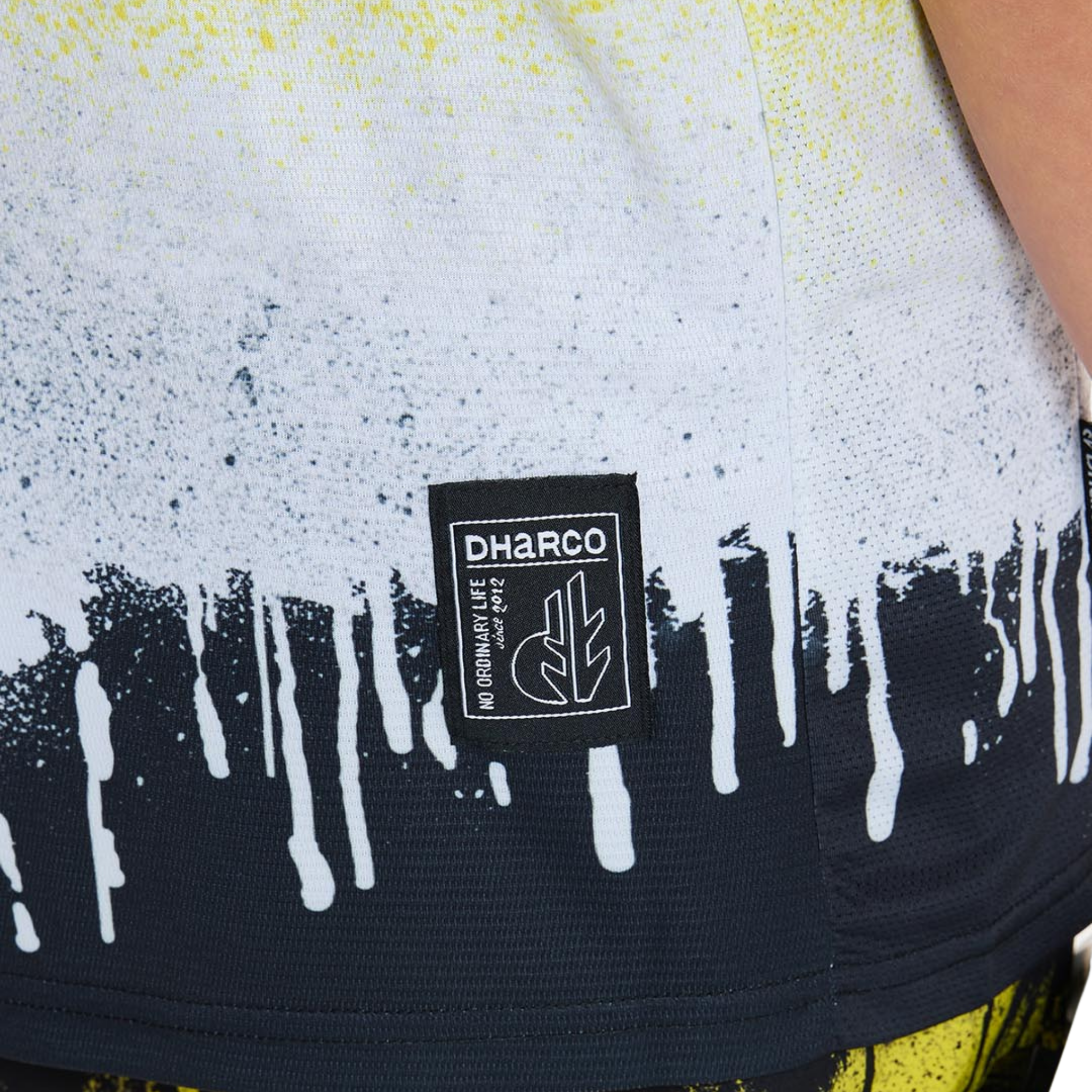 DHaRCO Youth Short Sleeve Jersey in Acid Rain design with 100% recycled quick-drying and moisture-wicking performance fabric
