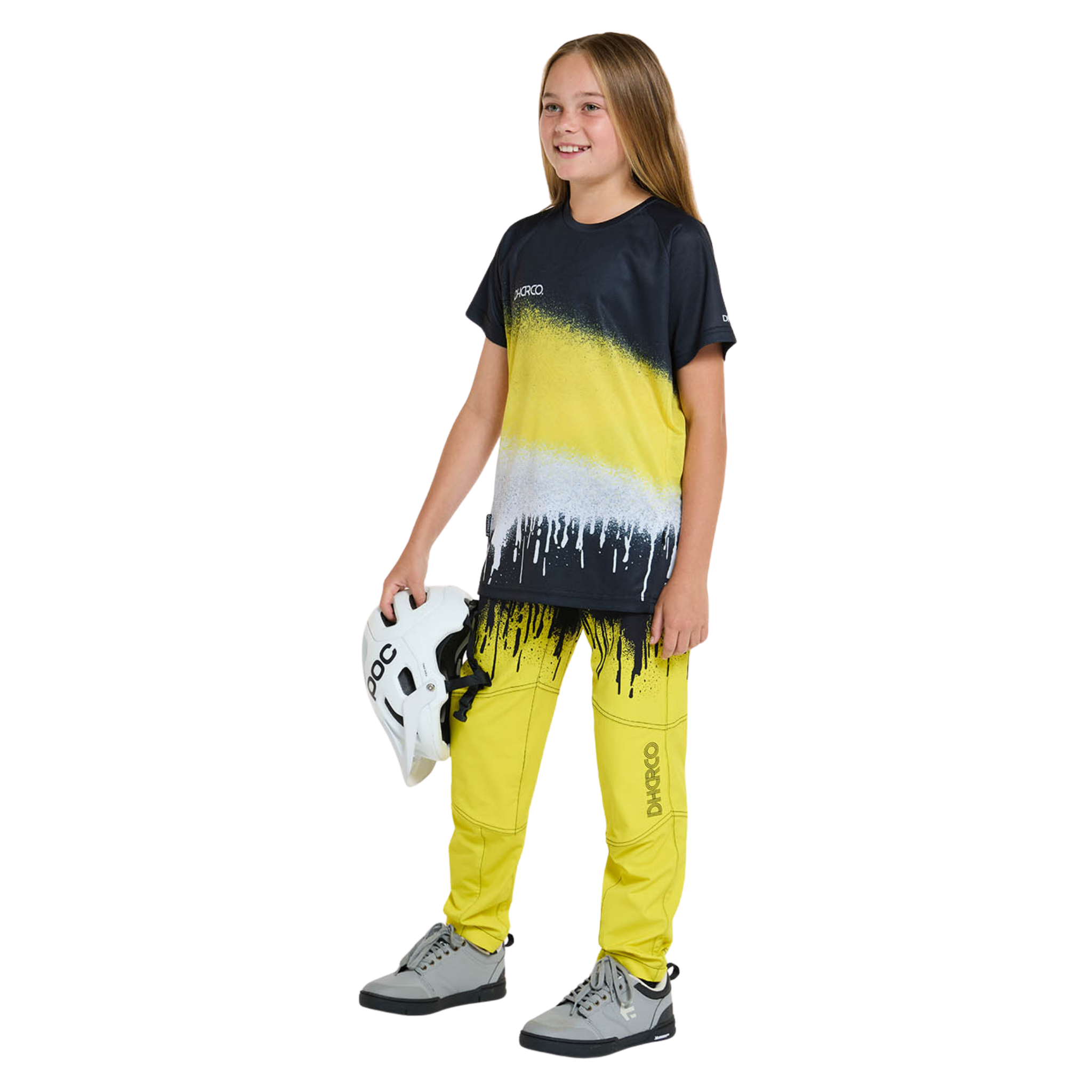 Side view of DHaRCO Youth Short Sleeve Jersey in Acid Rain design with breathable mesh side panel and zip storage pocket