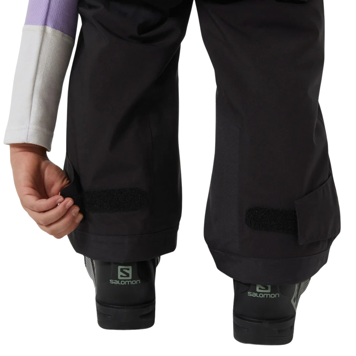 Helly Hansen Jr Stellar Bib Pants in Black with internal boot gaiter and gripper elastic designed to help keep snow out of ski boots