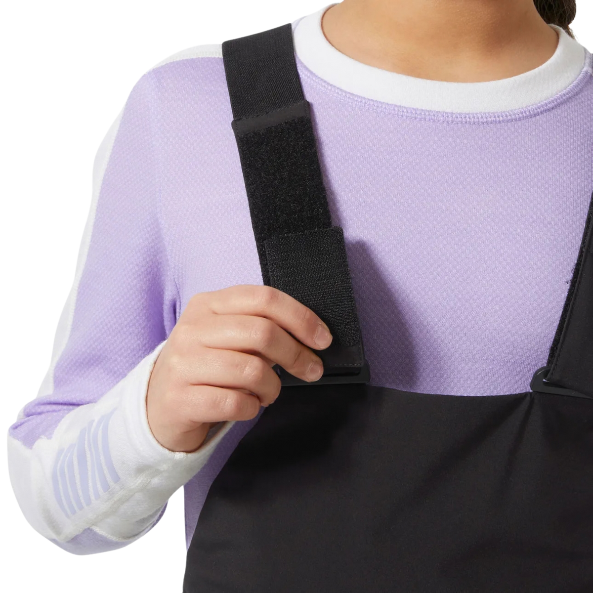 Helly Hansen Jr Stellar Bib Pants in Black with adjustable elastic suspenders designed for a secure and comfortable fit