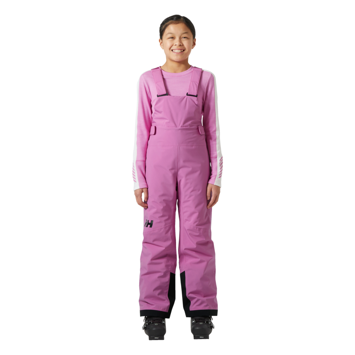 Front view of Helly Hansen Jr Stellar Bib Pants in Meta Pink with insulated bib construction, adjustable elastic suspenders and waterproof 2-layer fabric