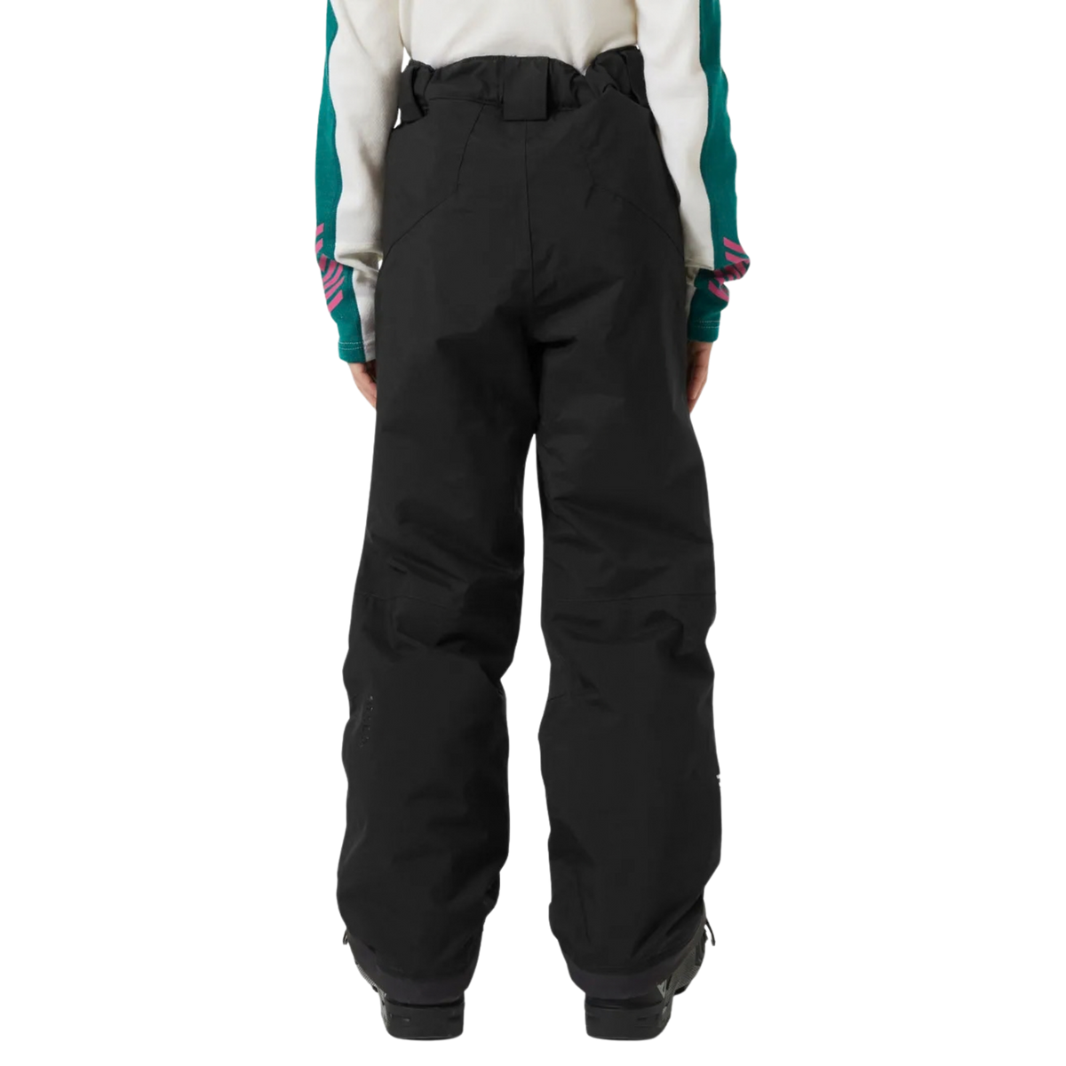 Junior skier wearing Helly Hansen Legendary Pant with HELLY TECH waterproof protection and PrimaLoft insulation while skiing in Whistler