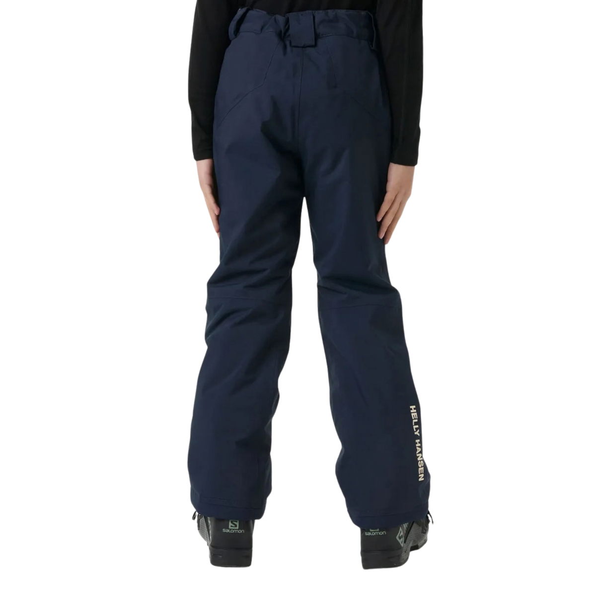 Junior skier wearing Helly Hansen Legendary Pant with HELLY TECH waterproof protection and PrimaLoft insulation while skiing in Whistler