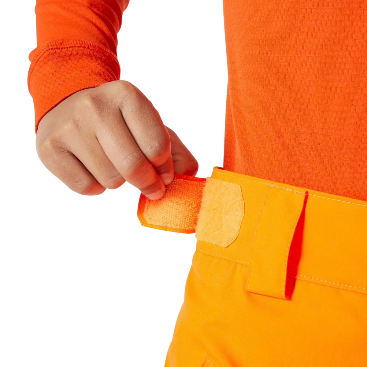 Helly Hansen Junior Legendary Pants in Neon Orange with adjustable waistband with belt loops for a secure and comfortable ski pant fit