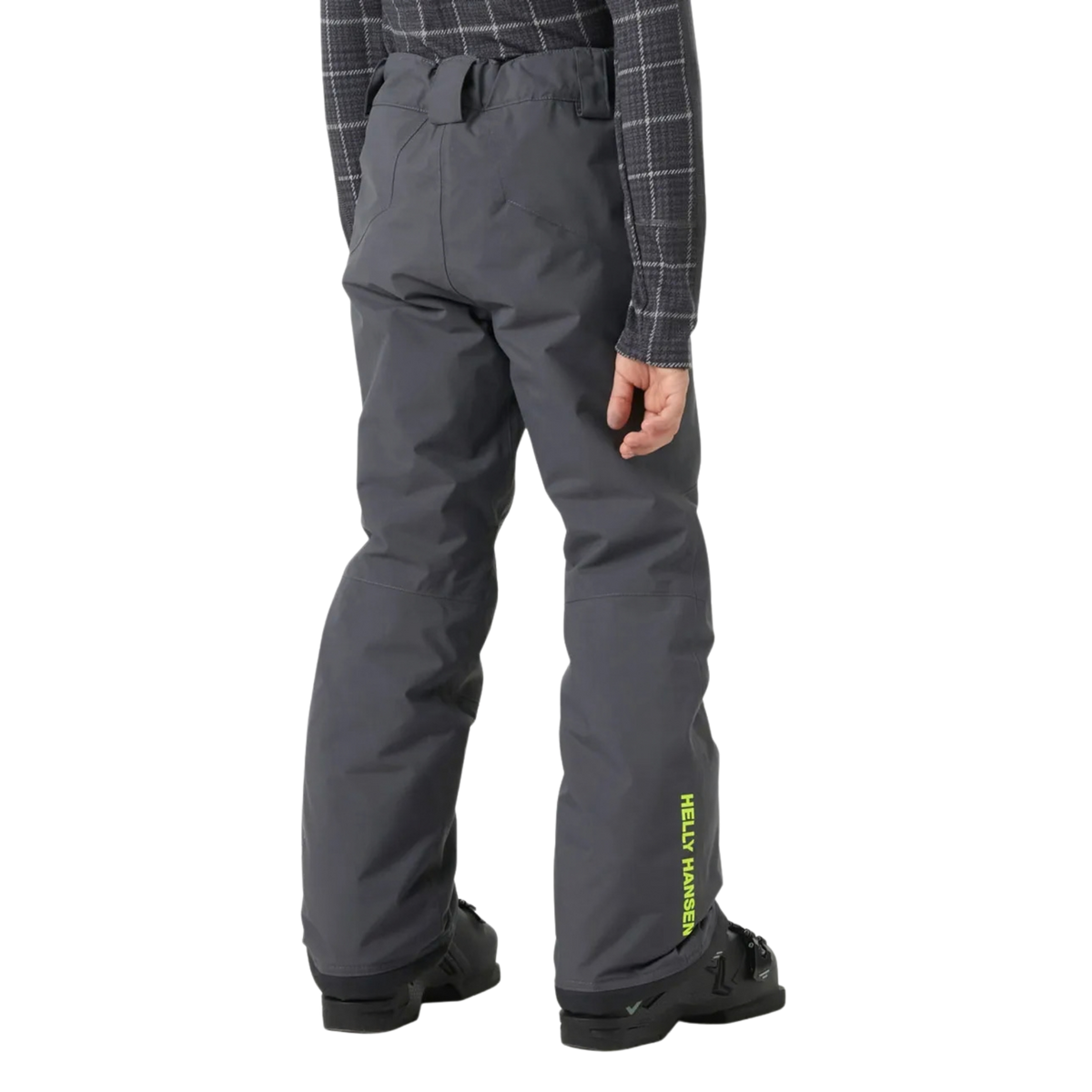 Junior skier wearing Helly Hansen Legendary Pants with HELLY TECH waterproof protection and PrimaLoft insulation while skiing in Whistler