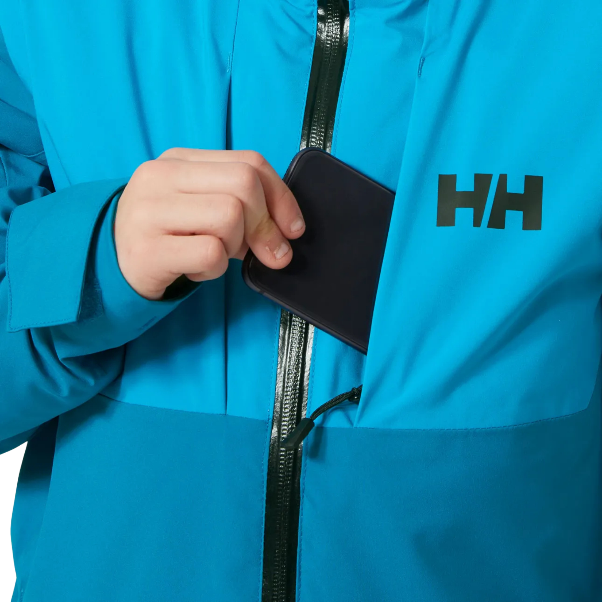 Helly Hansen Juniors Alpha Ski Jacket  in Cerulean Blue with YKK zippered chest pocket and waterproof HELLY TECH Performance shell