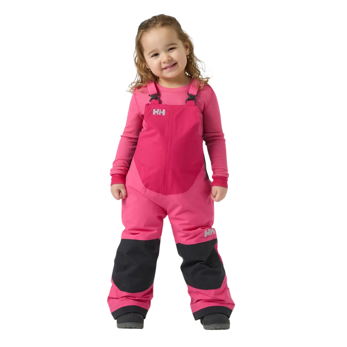 Front view of Helly Hansen Kids Rider 2.0 Insulated Bib Pants in Hot Pink with waterproof HELLY TECH Performance and adjustable suspenders