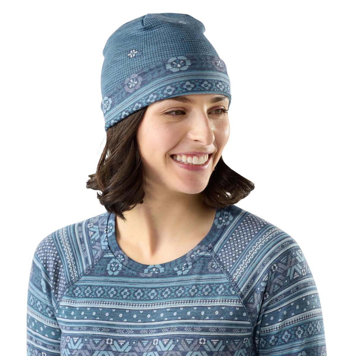 Side view of Smartwool Thermal Merino Reversible Cuffed Beanie in Nightfall Fair Isle Fun design with roll cuff providing additional warmth around the ears