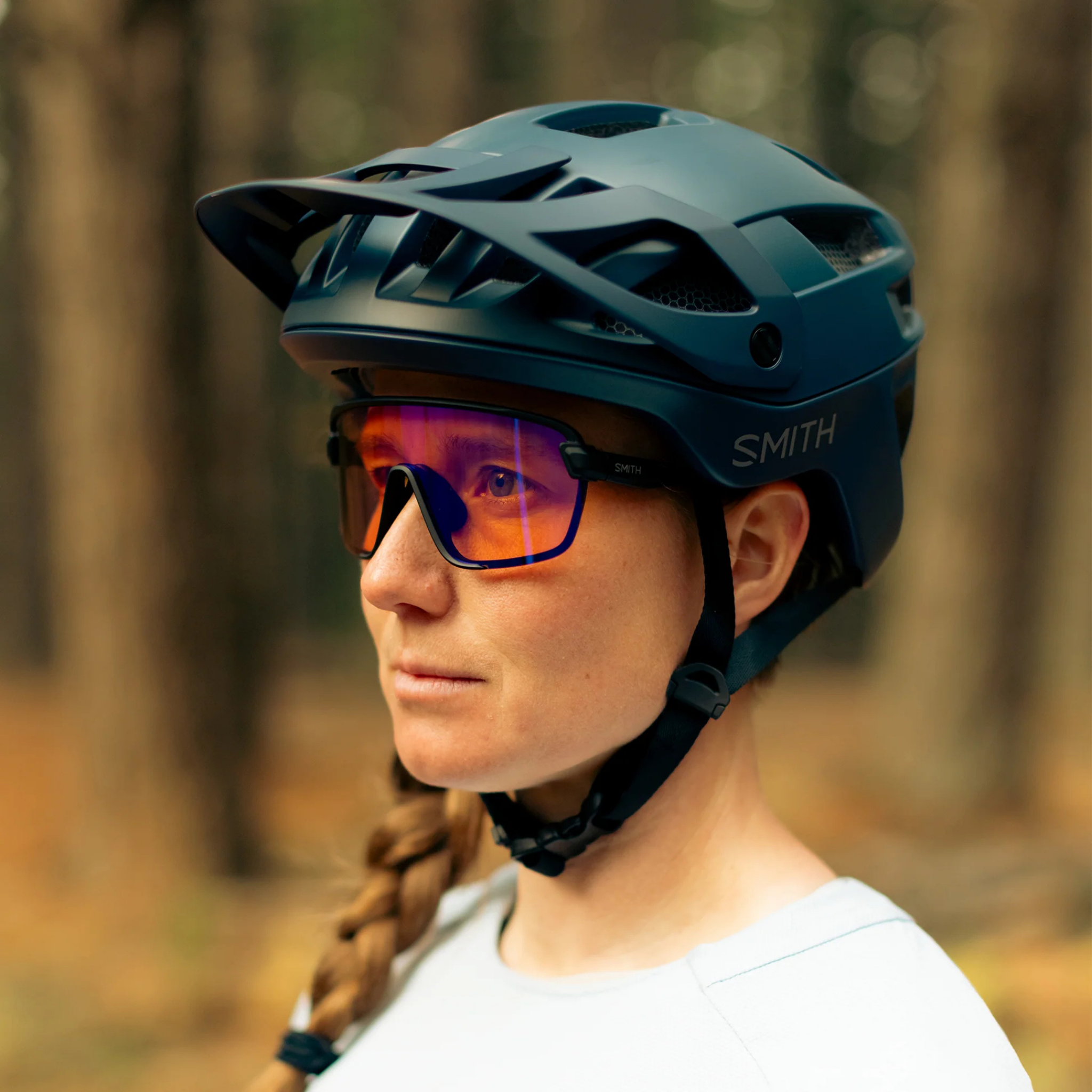 Mountain biker wearing the Smith Engage MIPS helmet riding technical trails at Whistler Bike Park