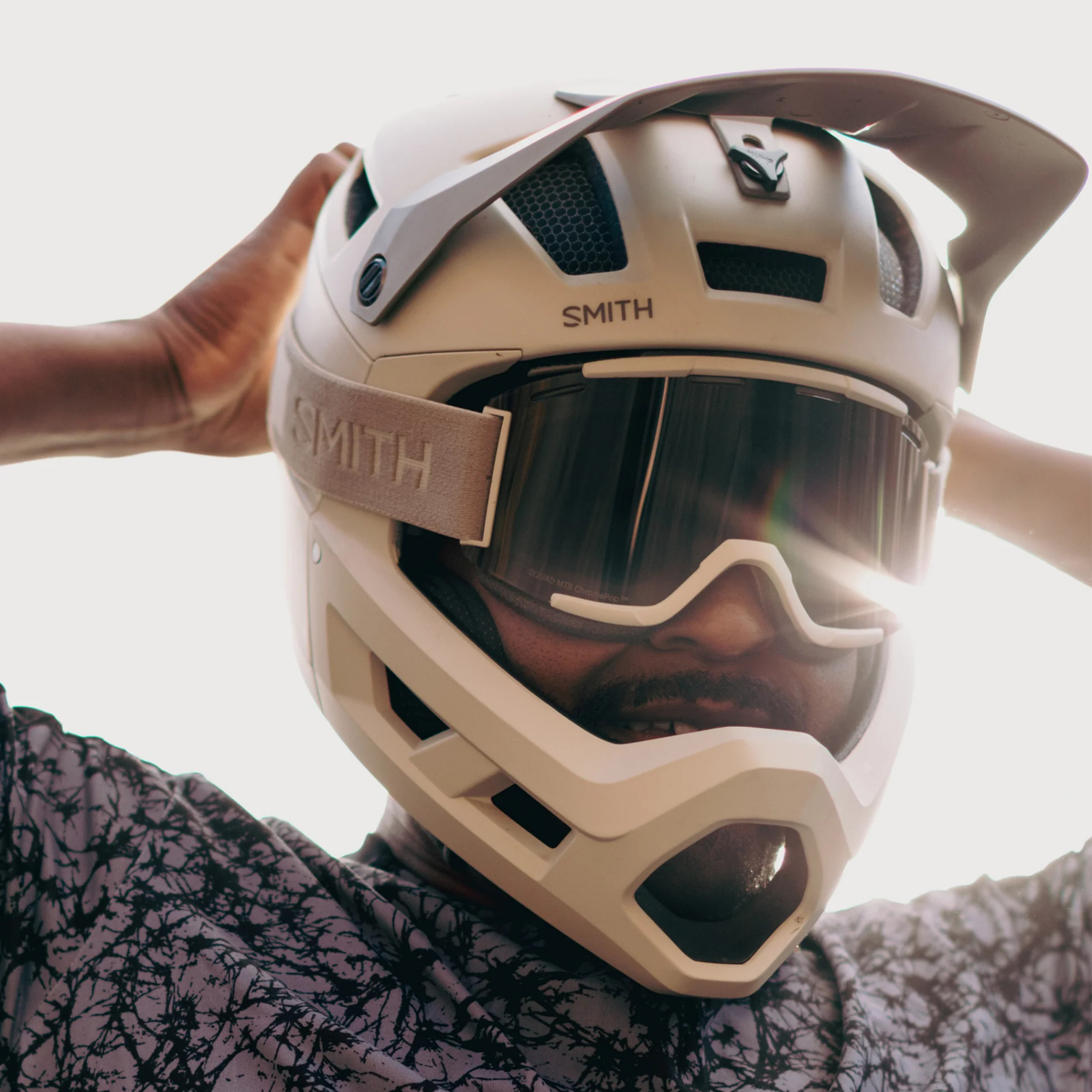 Mountain biker wearing the Smith Mainline MIPS full face helmet riding downhill at Whistler Bike Park